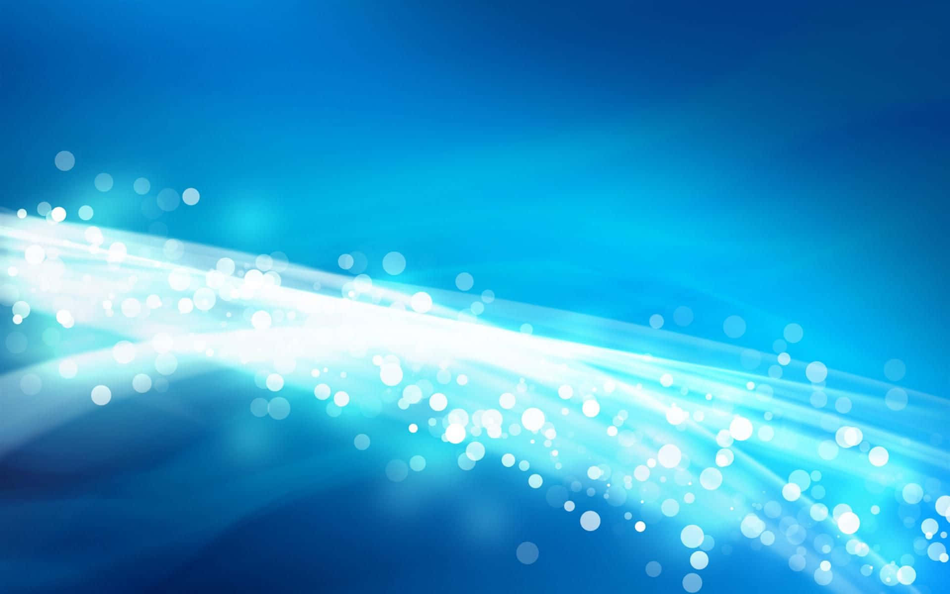 Blue Abstract Background With Lights And Bubbles