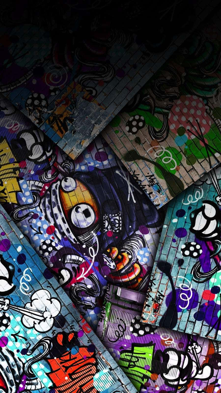A Group Of Skateboards With Different Graffiti Designs Wallpaper