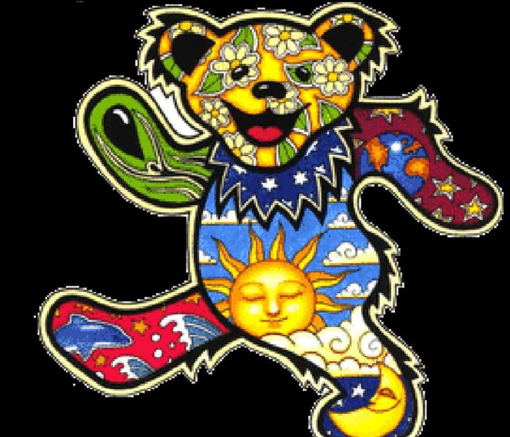 A vibrant and colorful Grateful Dead bear smiles out of the backdrop of a dream-like forest. Wallpaper