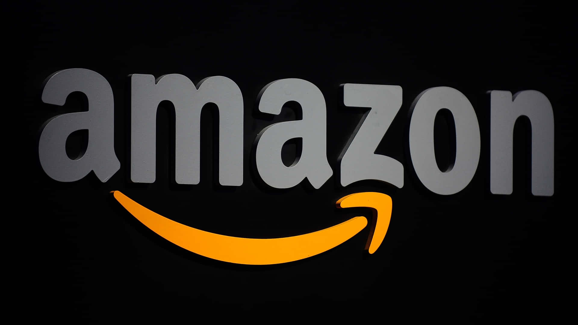 Logotipode Amazon Uk En Gris. Fondo de pantalla