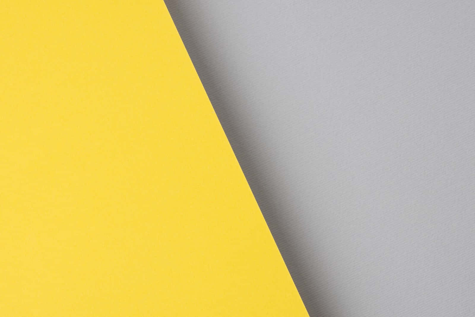 A bright gray and yellow background Wallpaper
