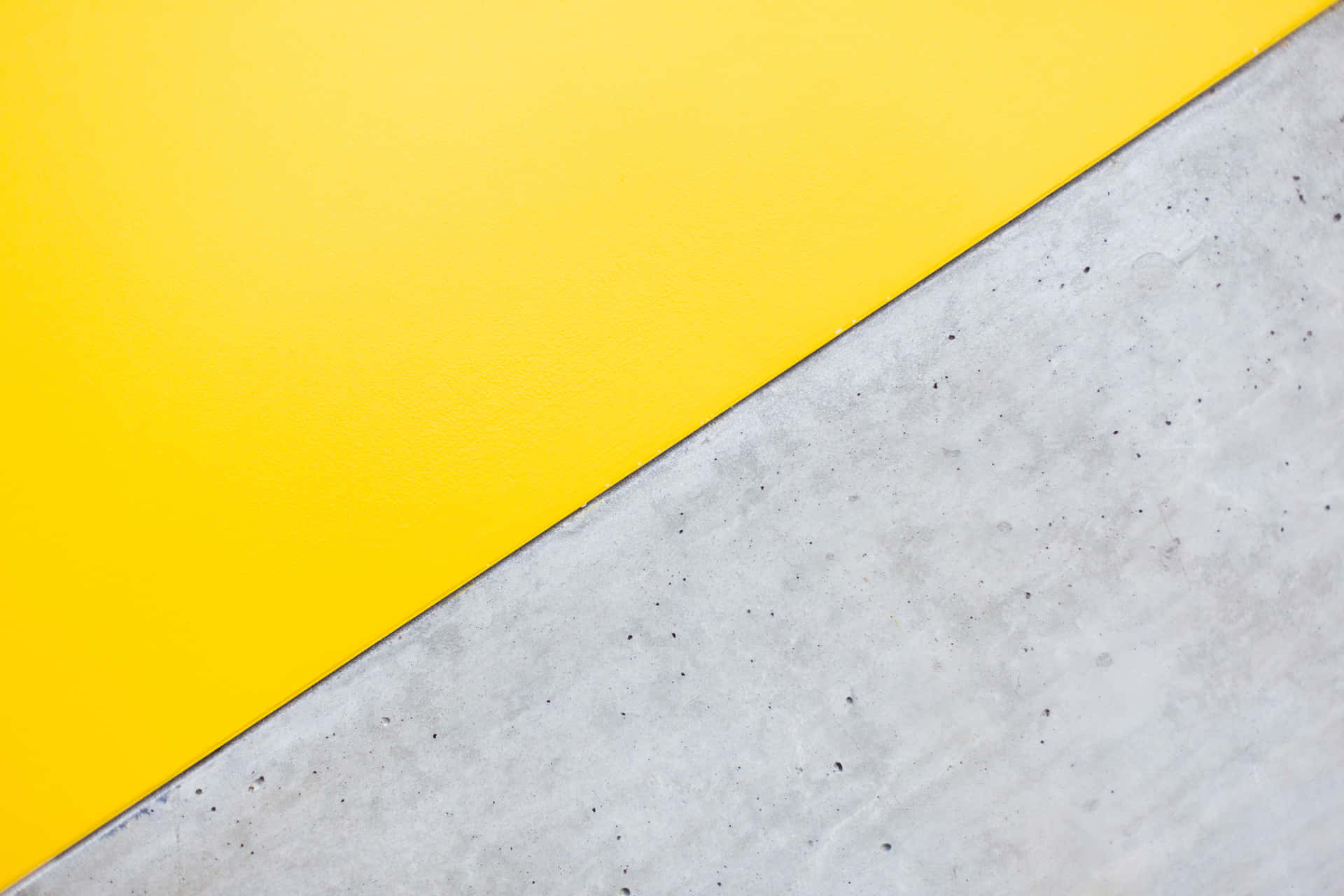 Eineminimalistische Graue Und Gelbe Tapete Wallpaper