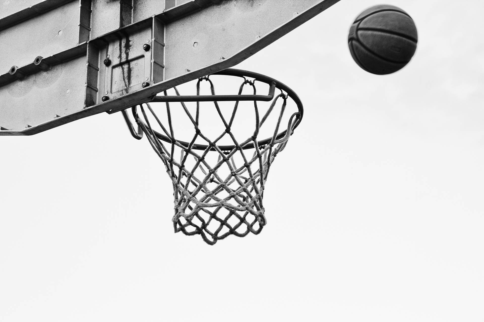Gray Ball Over Basketball Net Ring Wallpaper