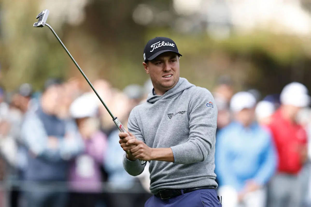 Caption: Acclaimed Golfer Justin Thomas In Gray Hoodie Wallpaper