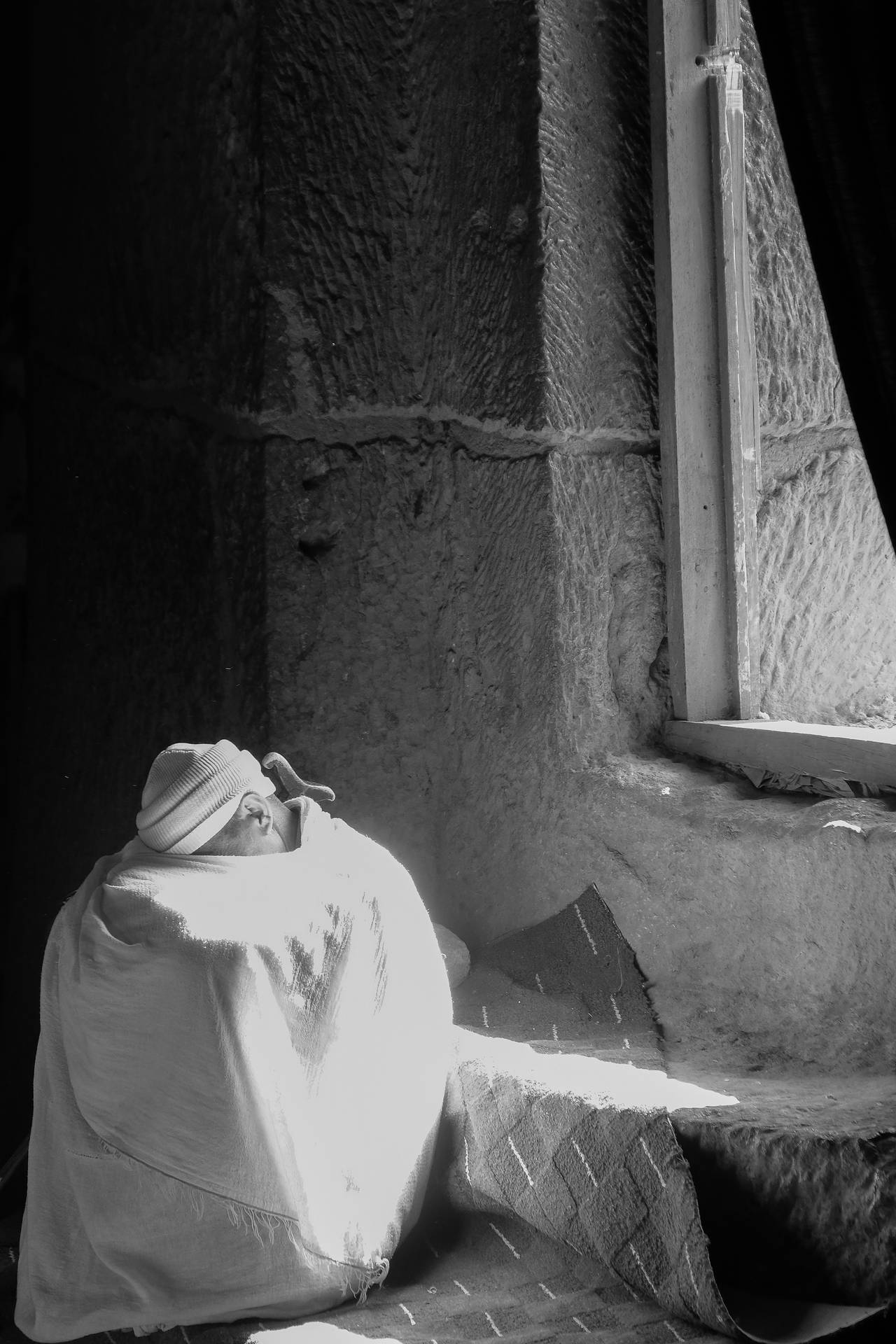 Grayscale Ethiopia Monk Hiding Face