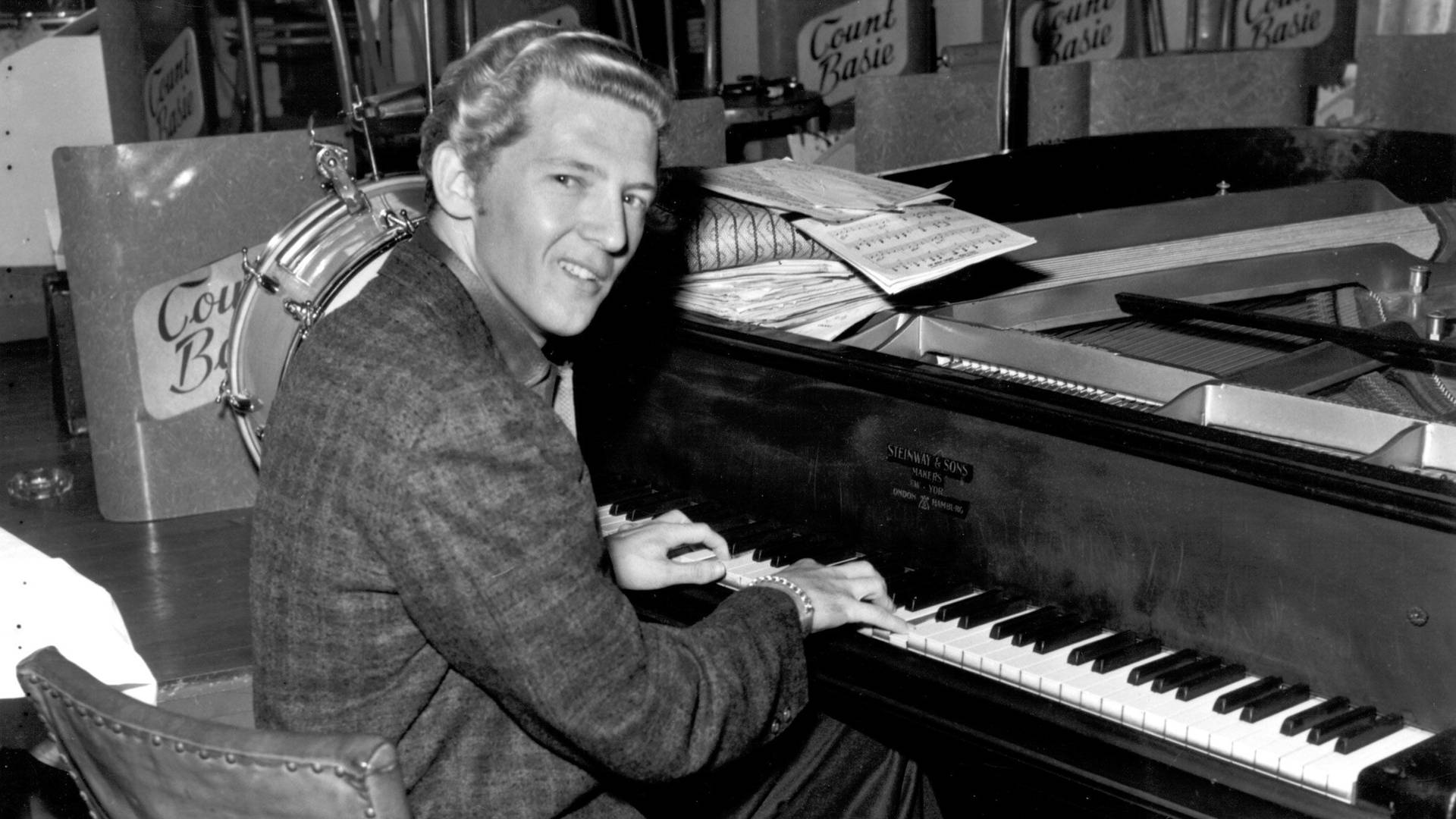 Grayscale Jerry Lee Lewis Playing Piano