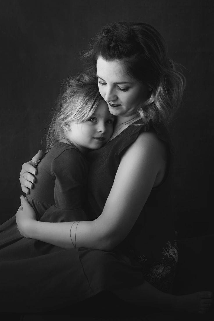Grayscale Mother And Daughter Portrait Wallpaper