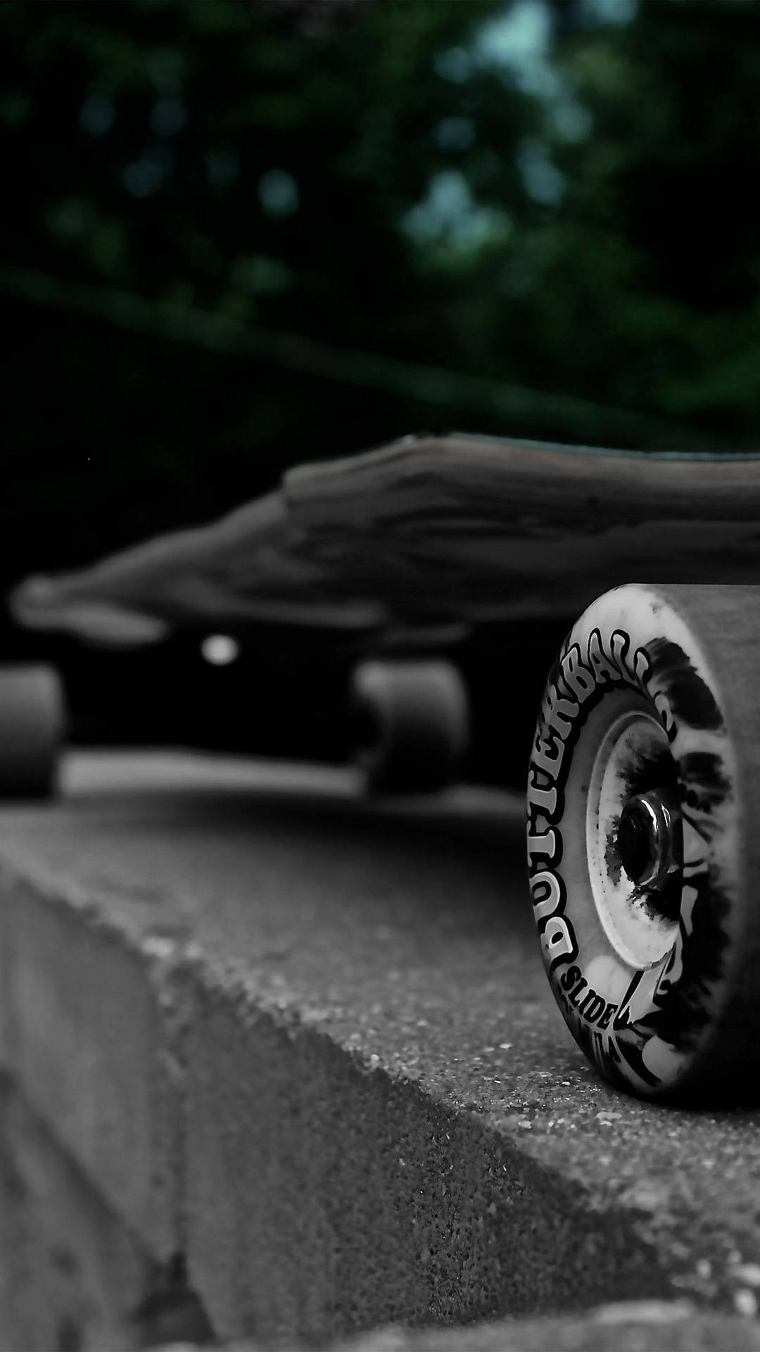 Grayscale Photo Wheels Of Skateboard iPhone Wallpaper