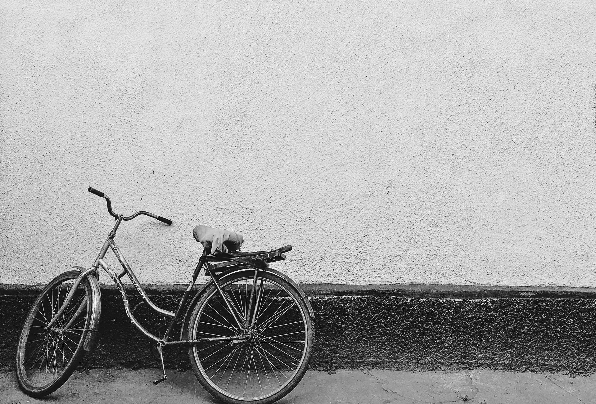 Grayscale Road Bike On Wall Background