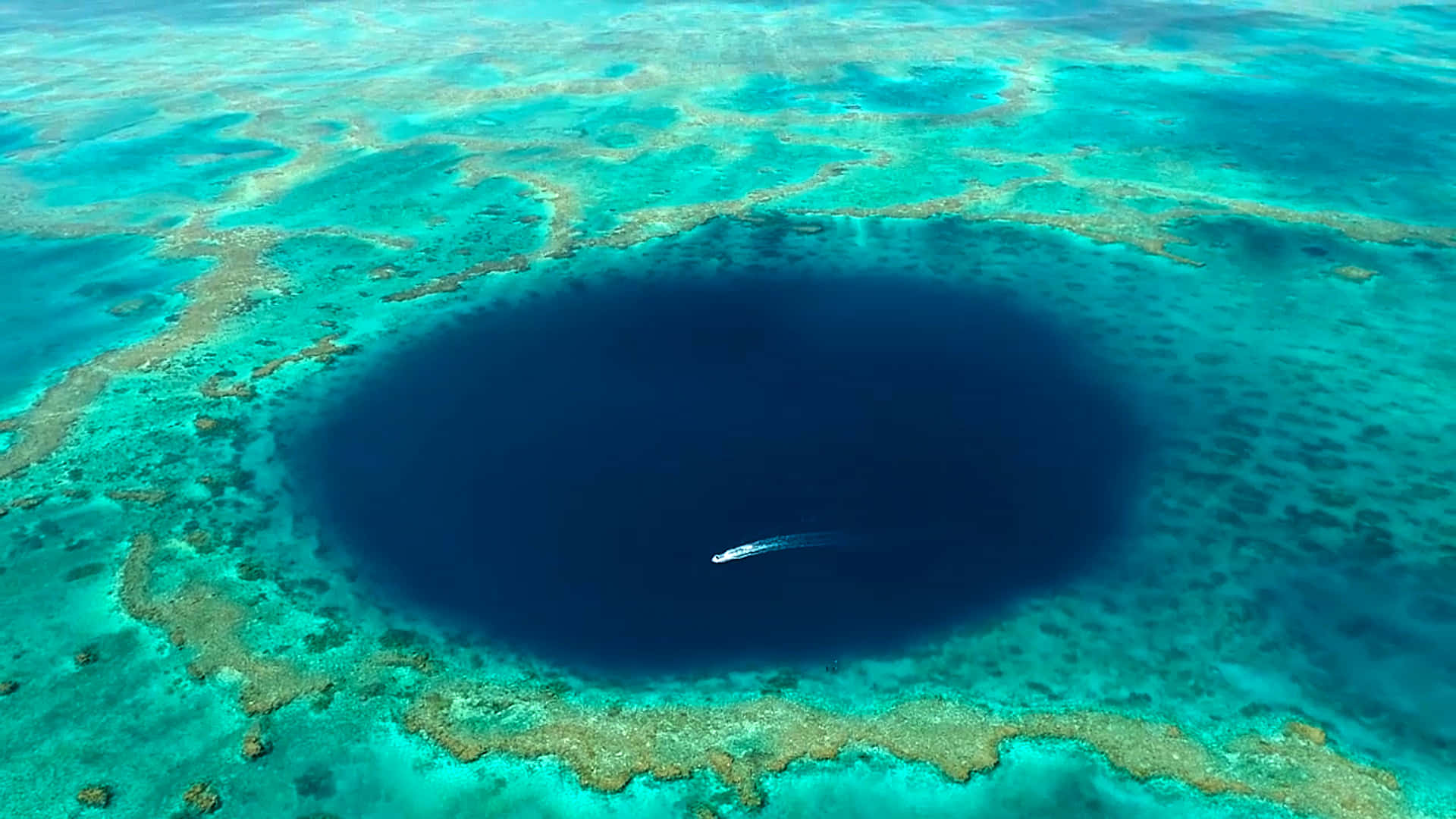 Great Blue Hole And A Boat Wallpaper