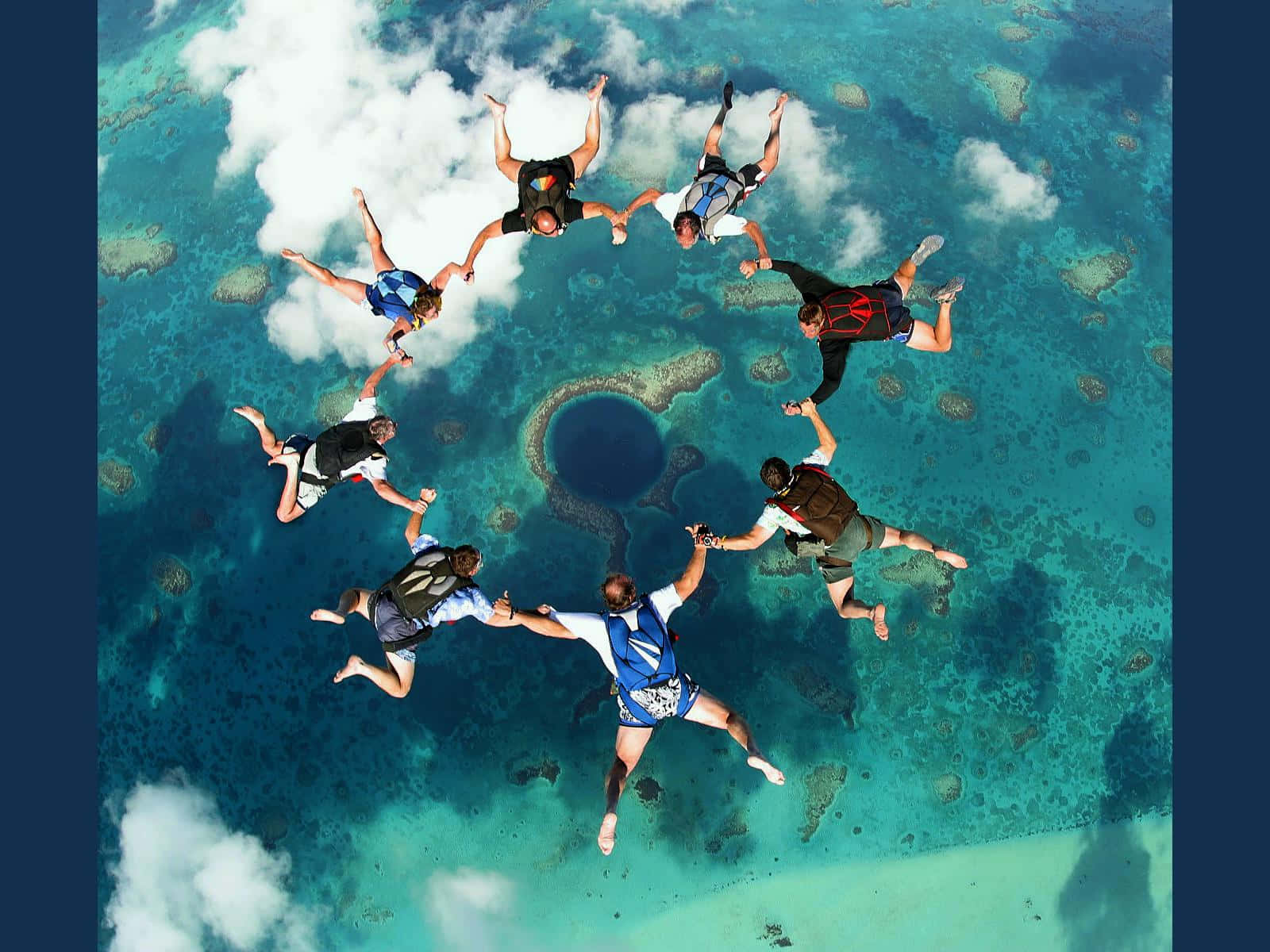 Great Blue Hole With Skydivers Wallpaper