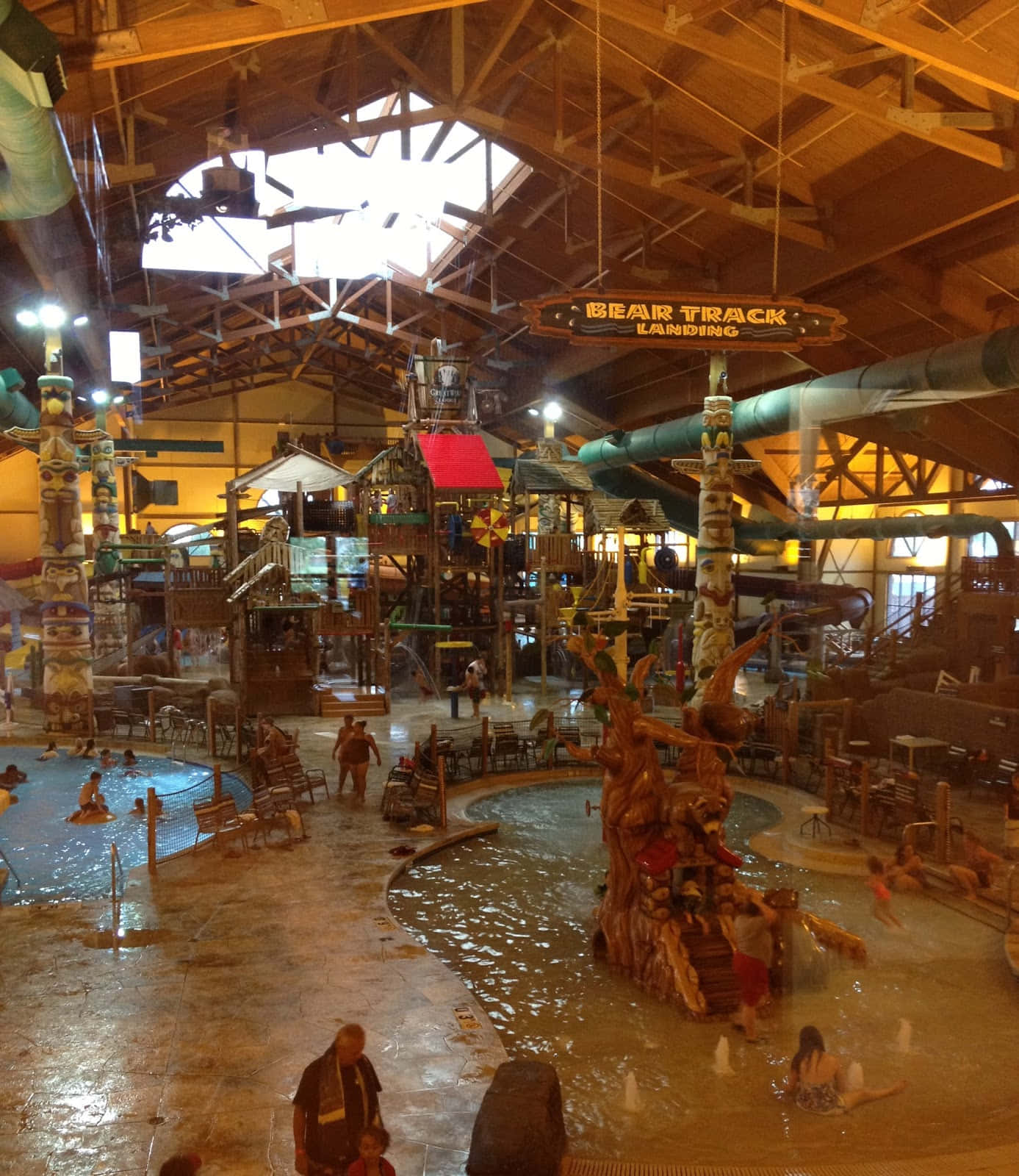 A Large Indoor Water Park With A Lot Of People