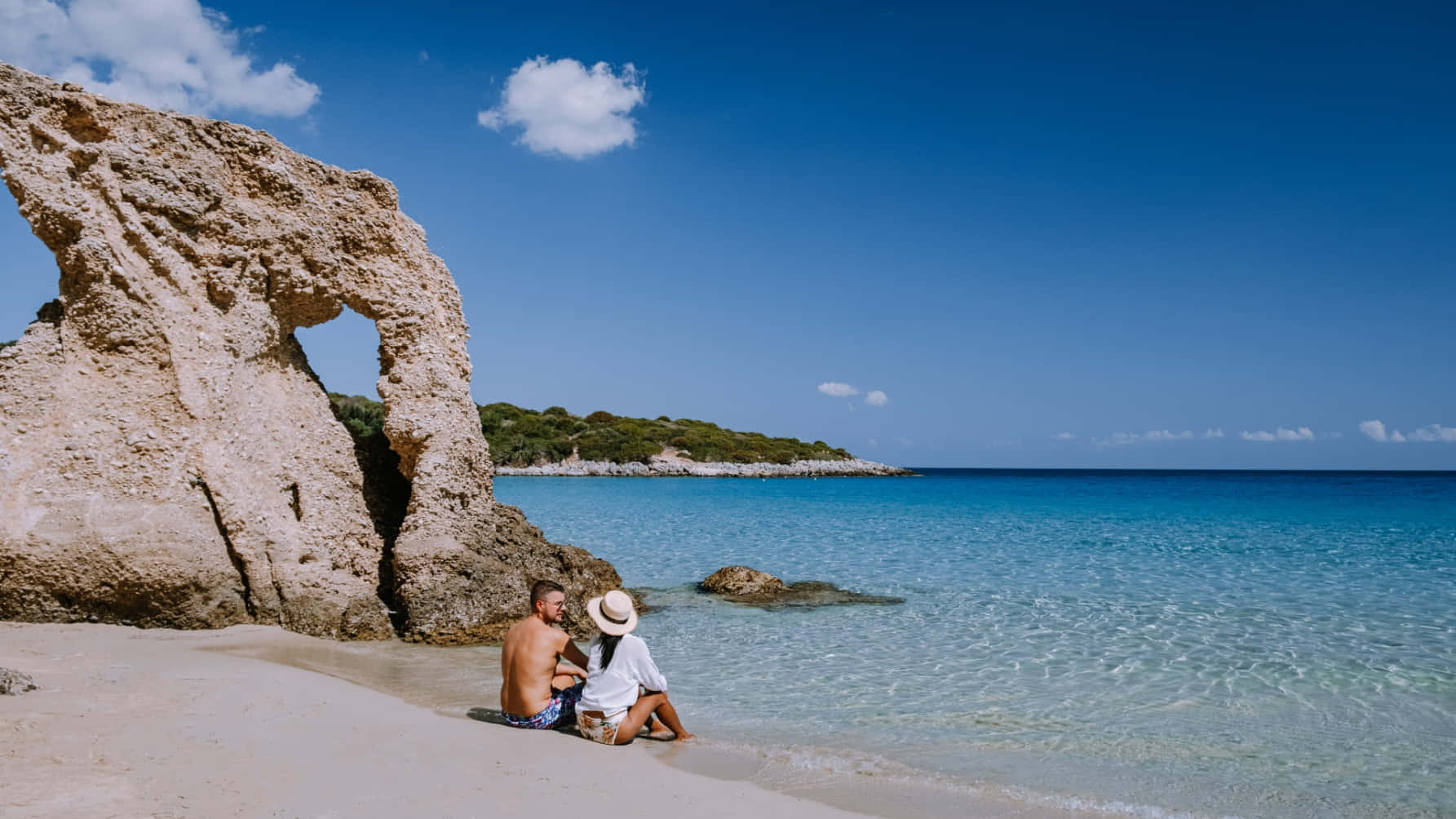 Serene Greek Beach Paradise Wallpaper