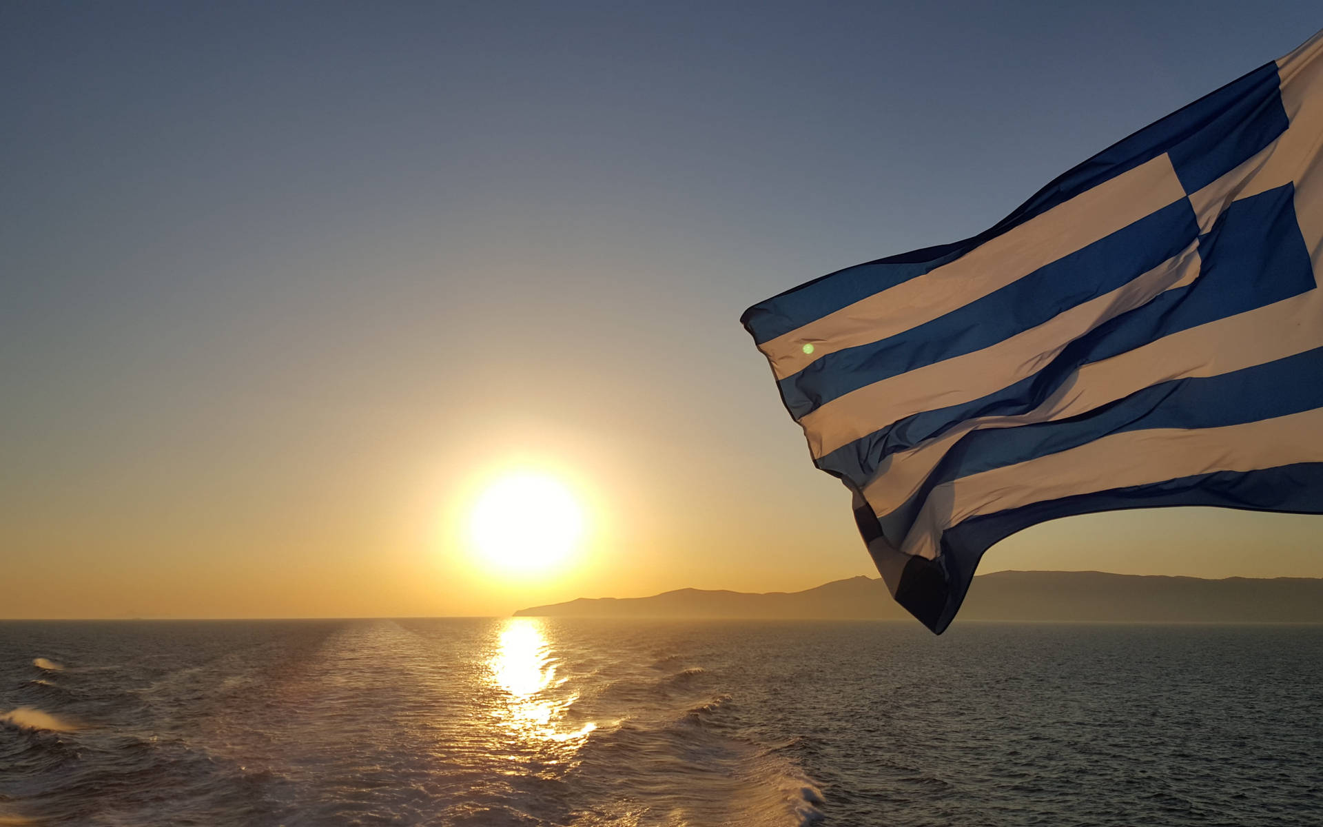 Griechischeflagge Bei Sonnenuntergang Wallpaper