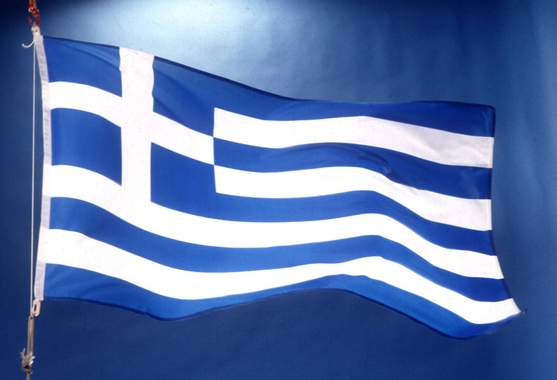 Græsk flagsymbol på en blå baggrund Wallpaper