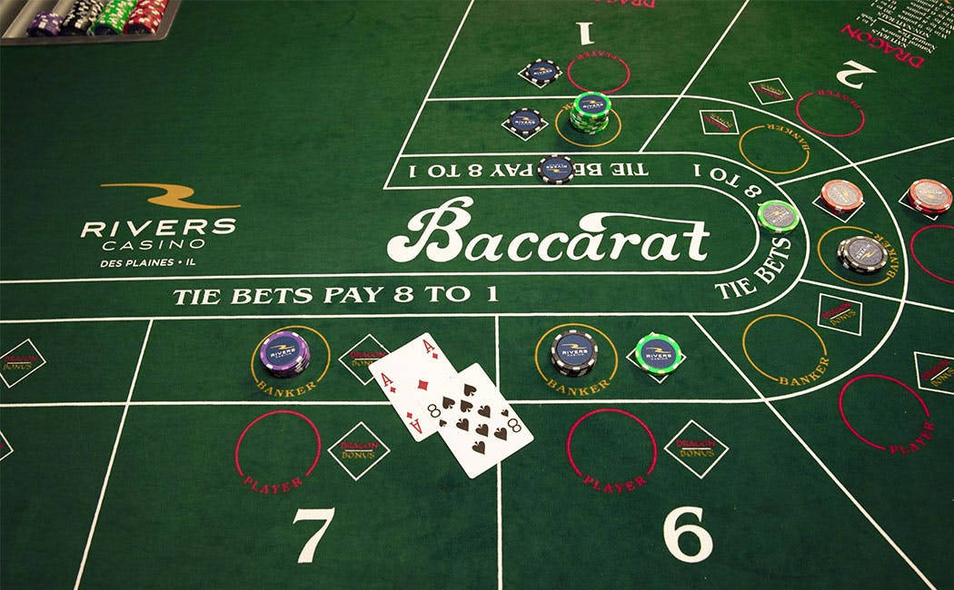Green Baccarat Table With Cards And Chips Wallpaper