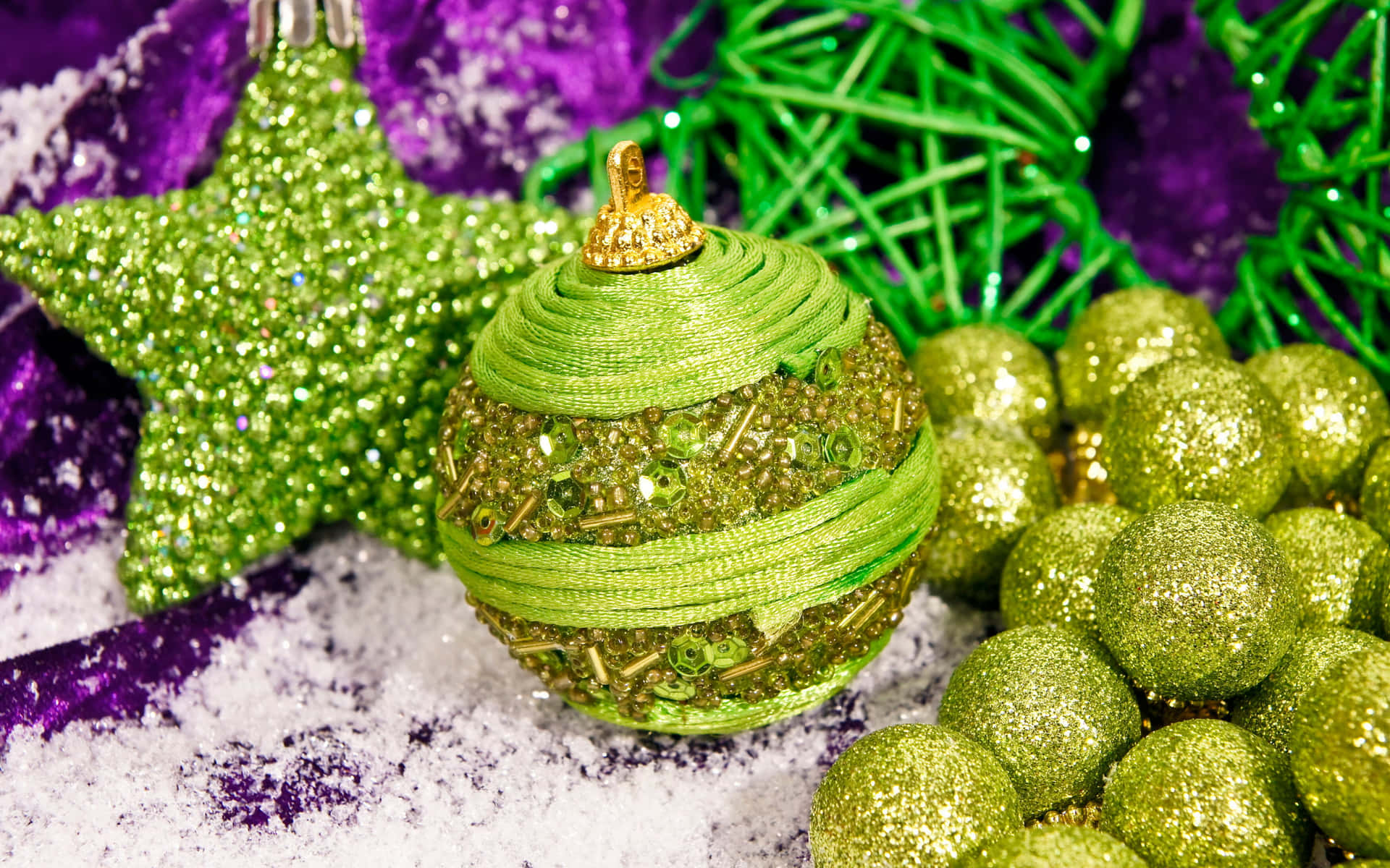 Christmas Ornaments And Decorations On A Purple And Green Background