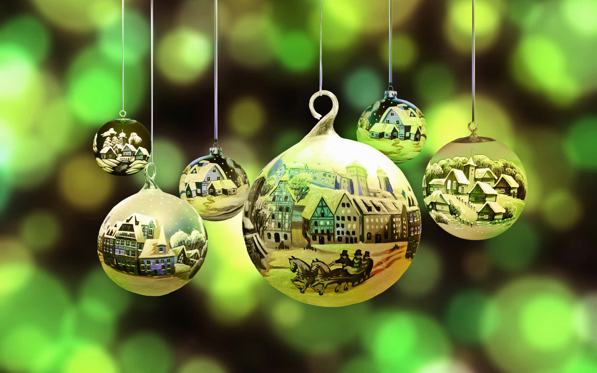 Christmas Ornaments Hanging On Strings With A Green Background