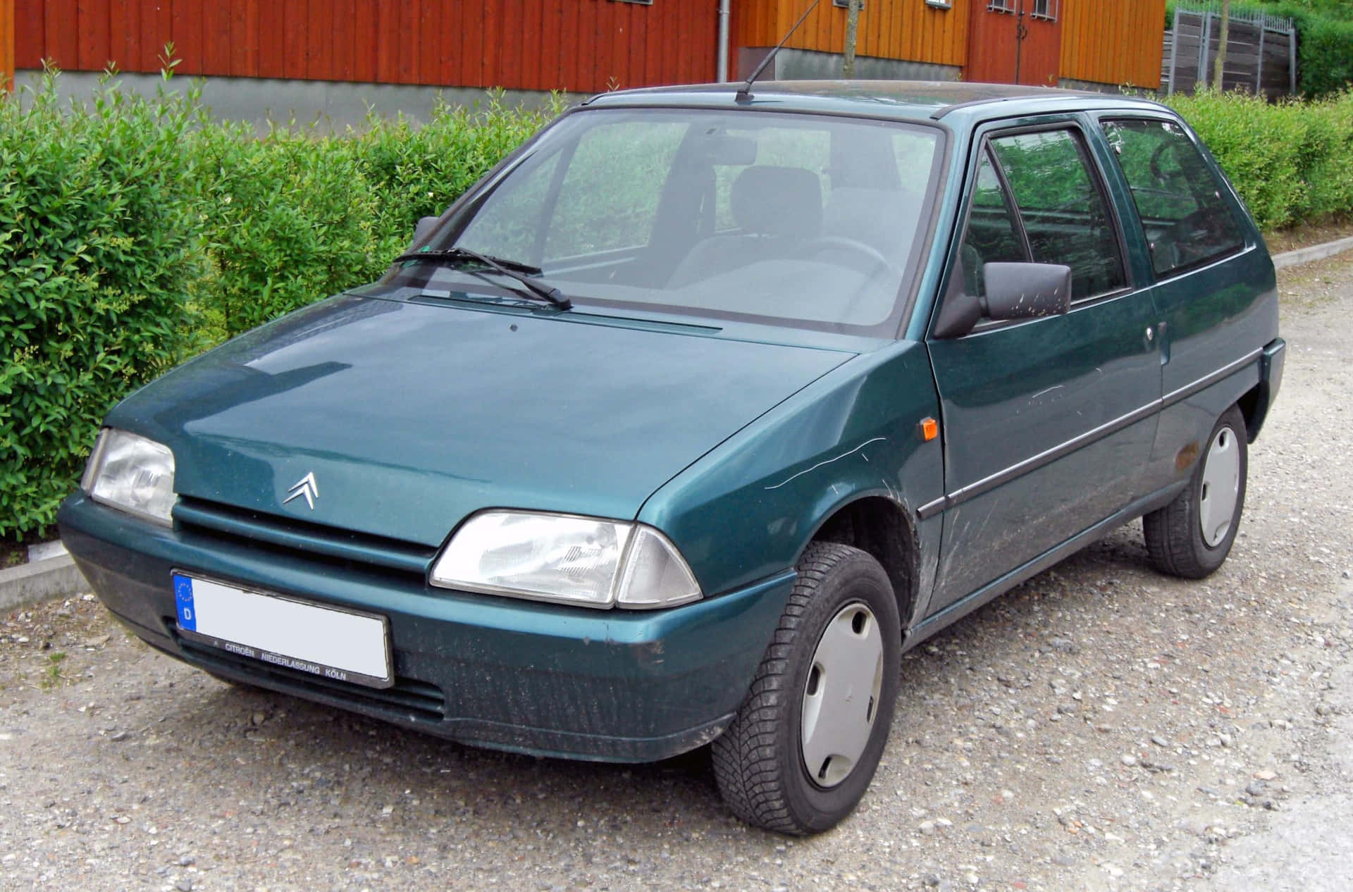 Groene Citroen A X Geparkeerd In De Buitenlucht Achtergrond