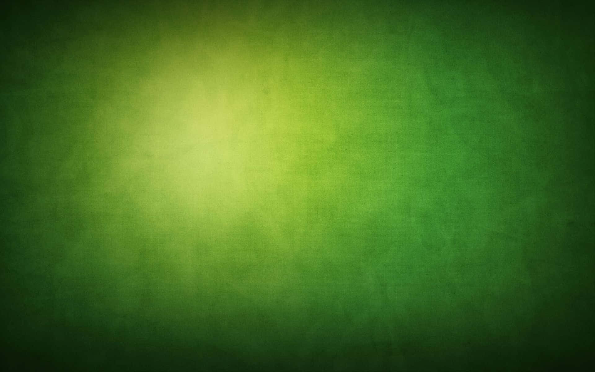 Et grønt bjerglandskab skrivebord tapet Wallpaper