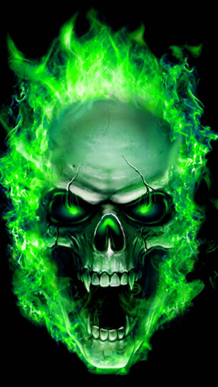 "A haunting skull ablaze in green flames sits atop a pile of gold coins." Wallpaper