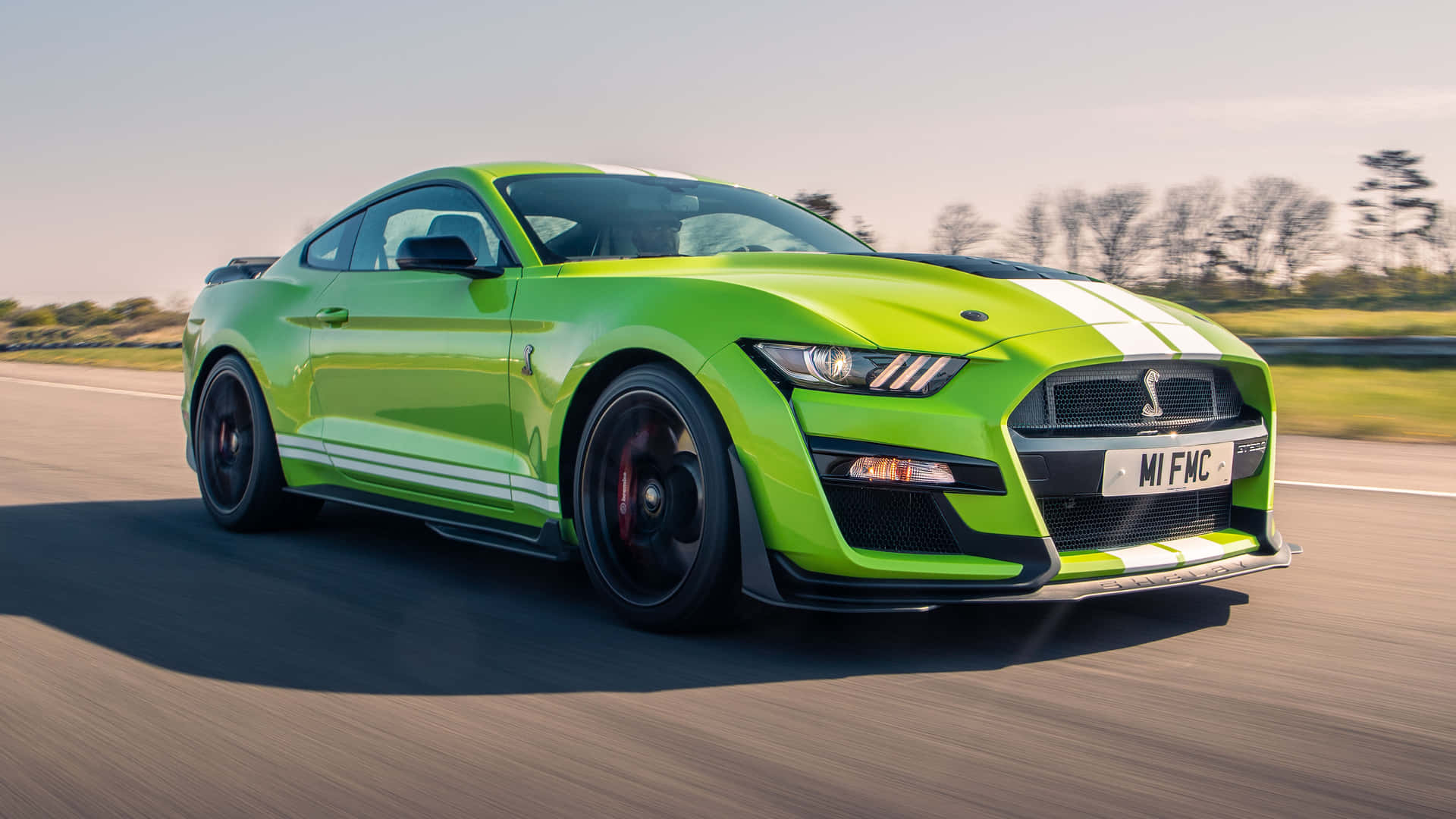 Green Ford Mustang Shelby G T500 Speeding Wallpaper