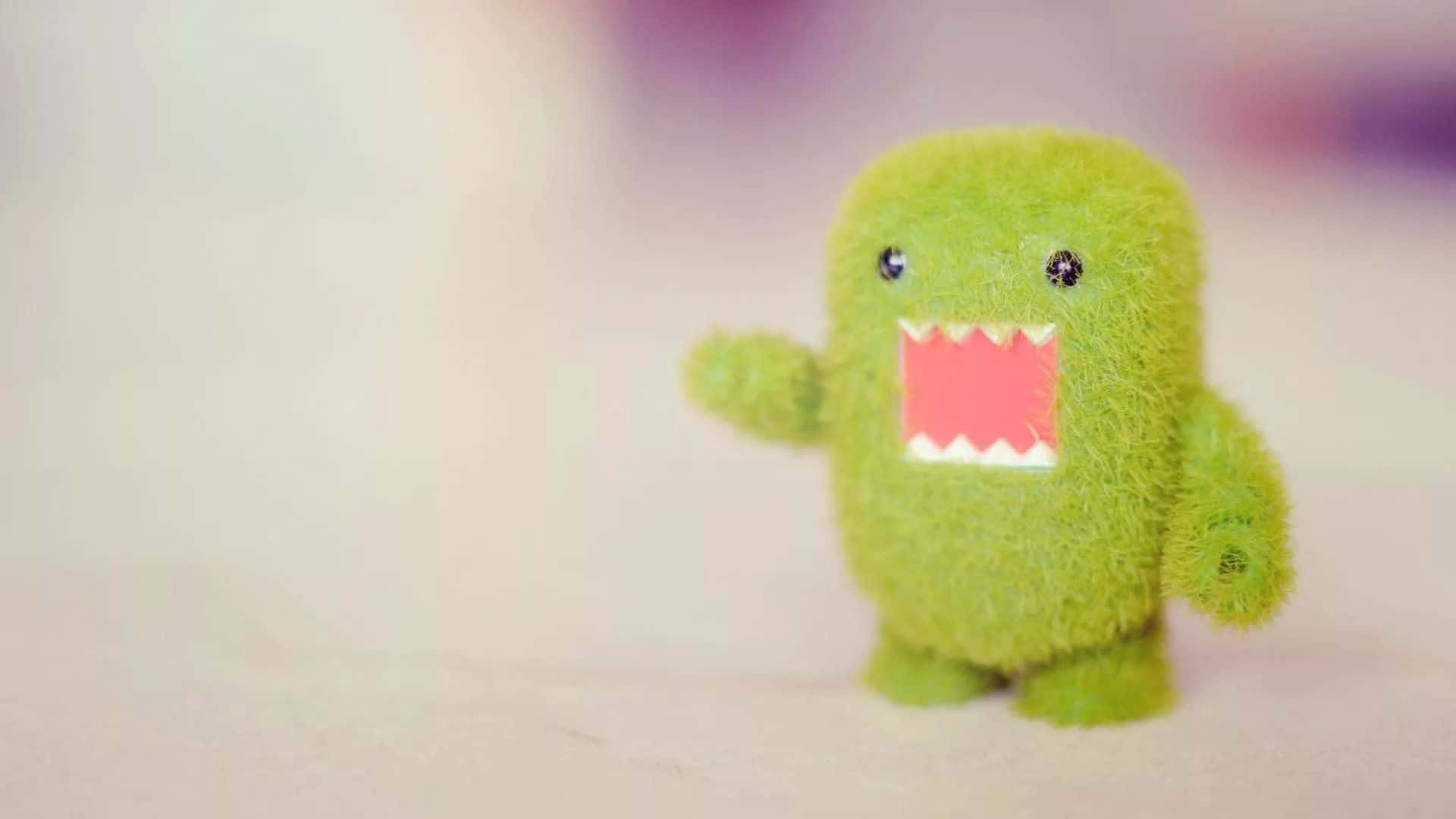 Green Fuzzy Monster Toy Wallpaper