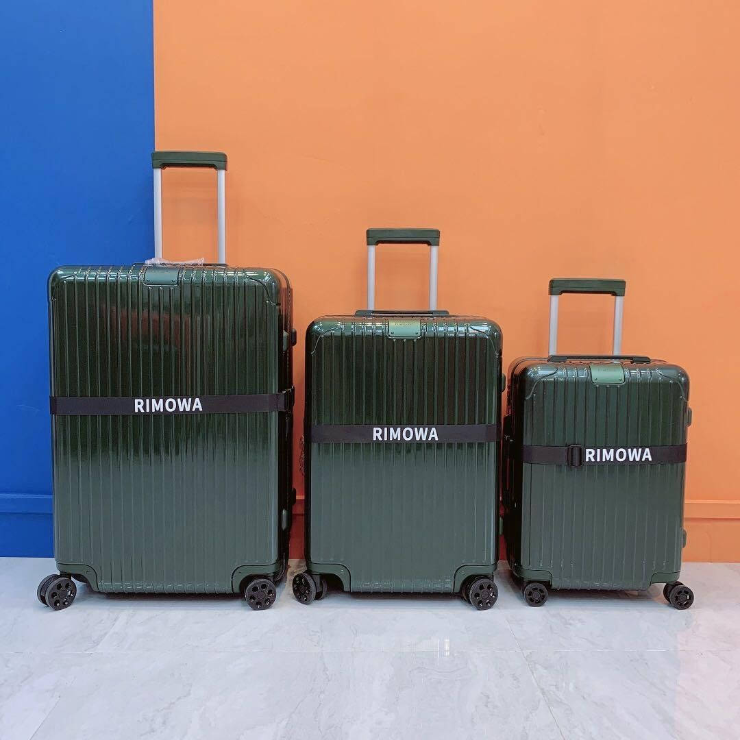 Green Gloss Rimowa Suitcases Wallpaper