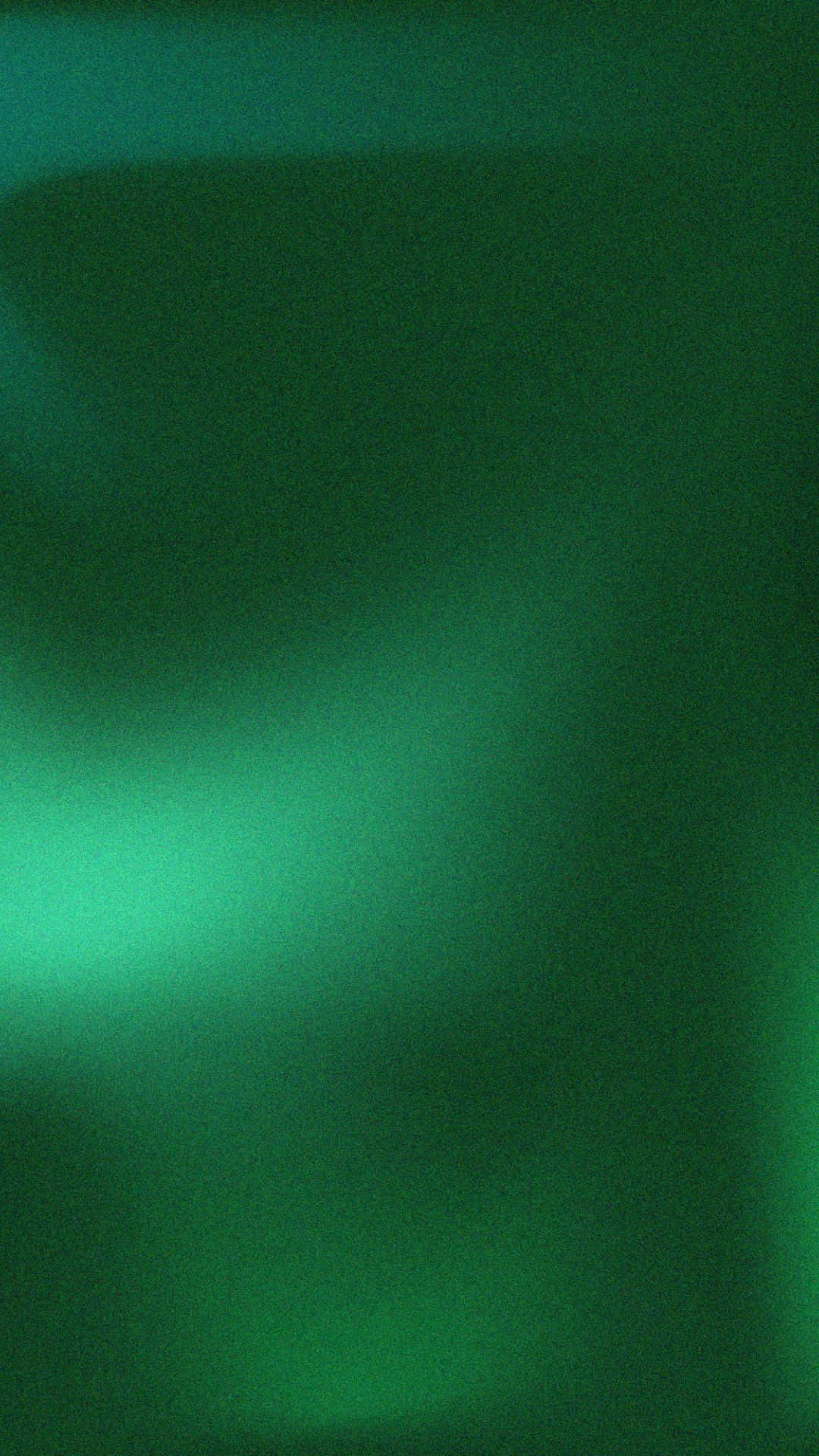 An abstract gradient of vibrant green shades.