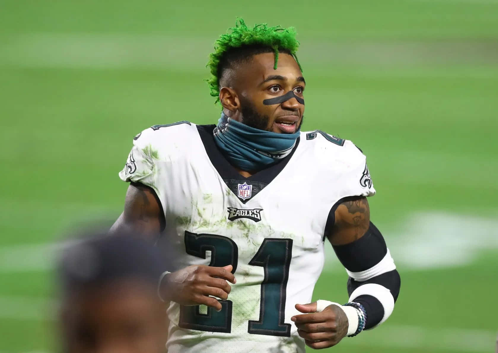 Green Haired Football Player Number21 Wallpaper