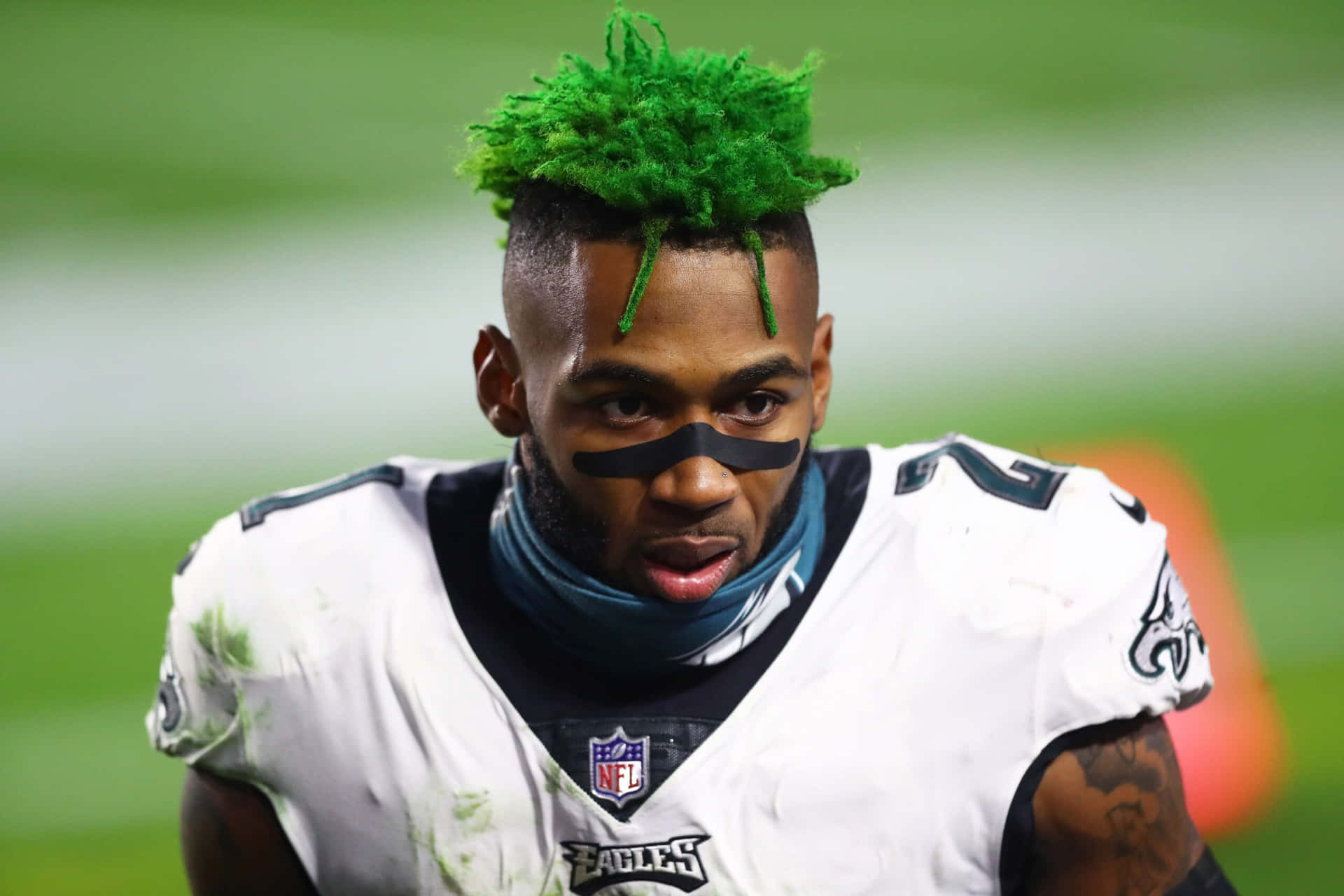 Green Haired Football Player Wallpaper