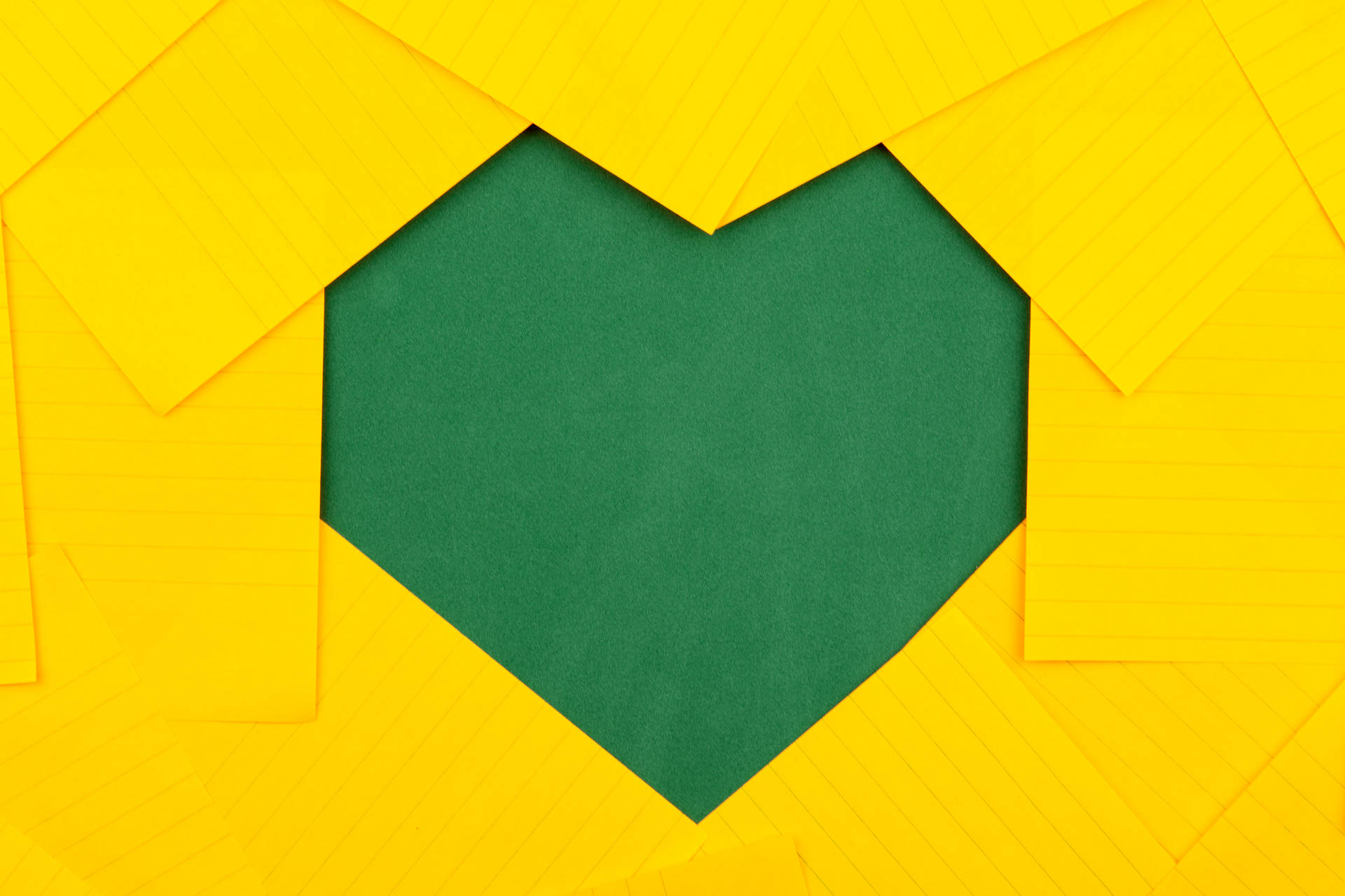 Green Heart On Yellow Paper Wallpaper