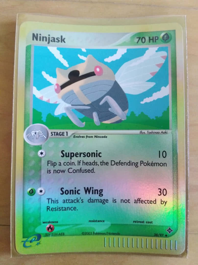 Caption: Iconic Ninjask Pokemon Trading Card Wallpaper