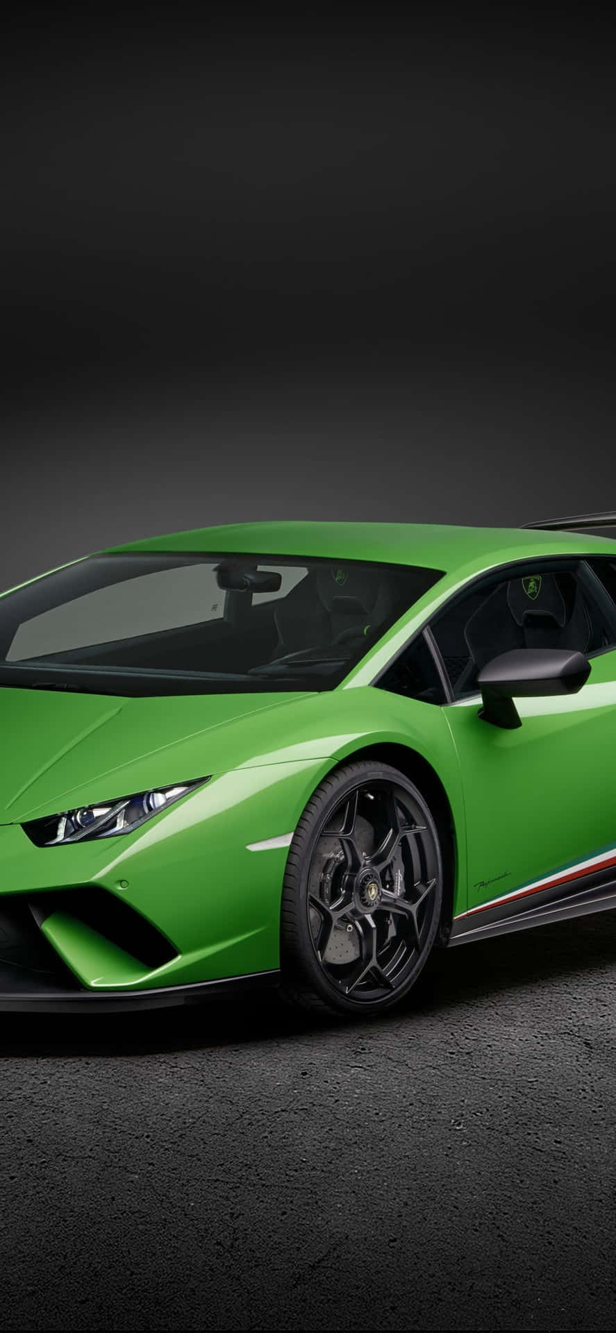 Tag din rejse til næste niveau med en grøn Lamborghini iphone. Wallpaper