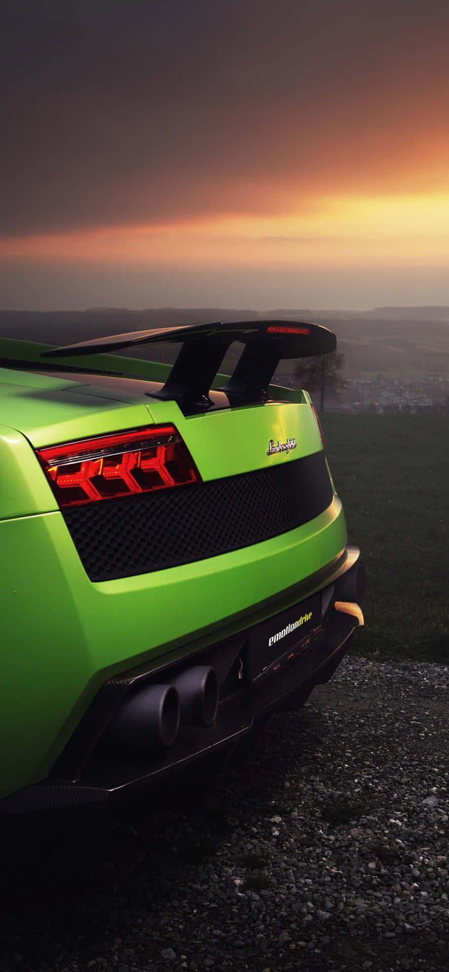 “Experience an unprecedented blend of luxury and performance with the green Lamborghini iPhone.” Wallpaper