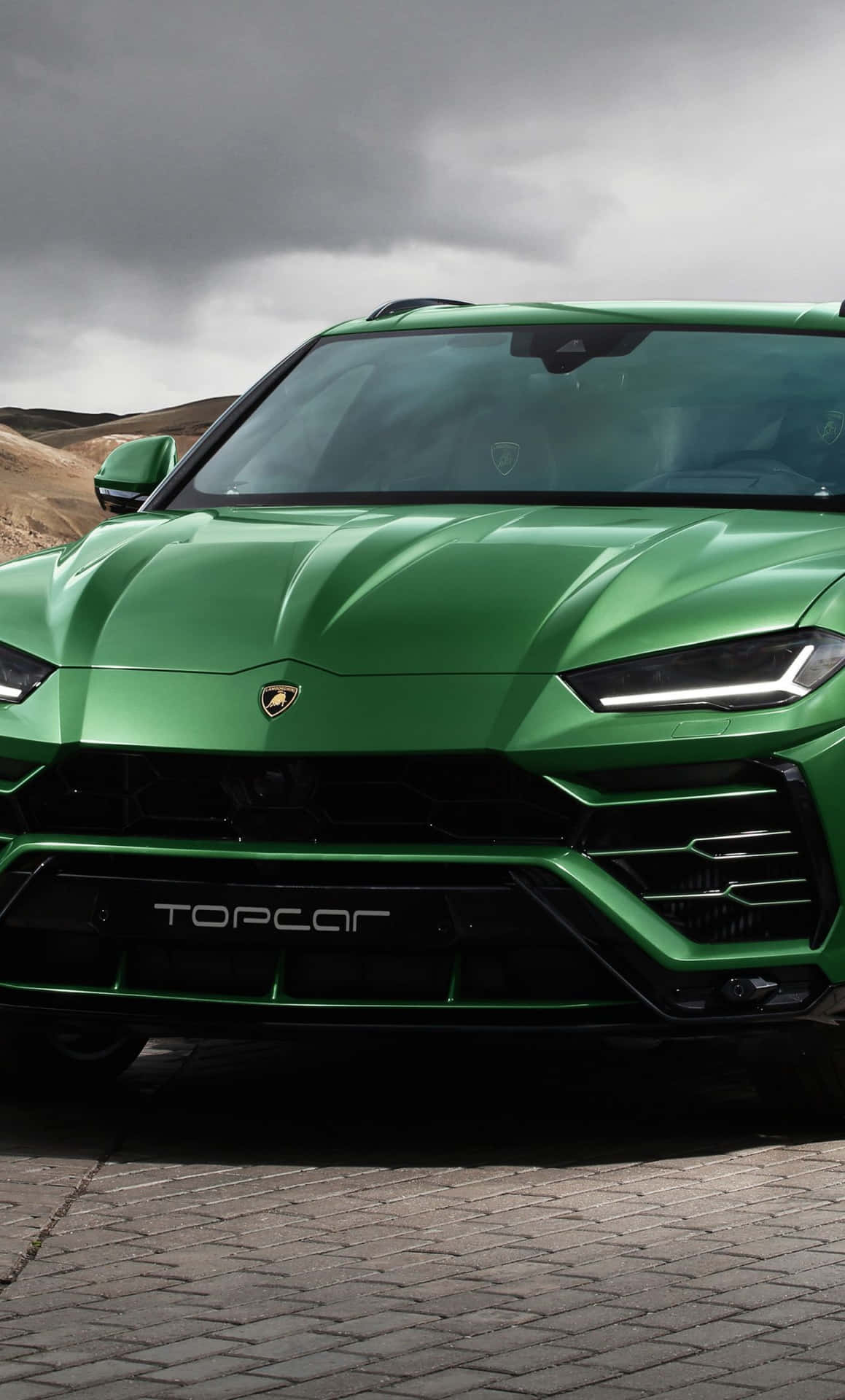 Føl den luksuriøse magt ved den nye grønne Lamborghini til din iPhone. Wallpaper