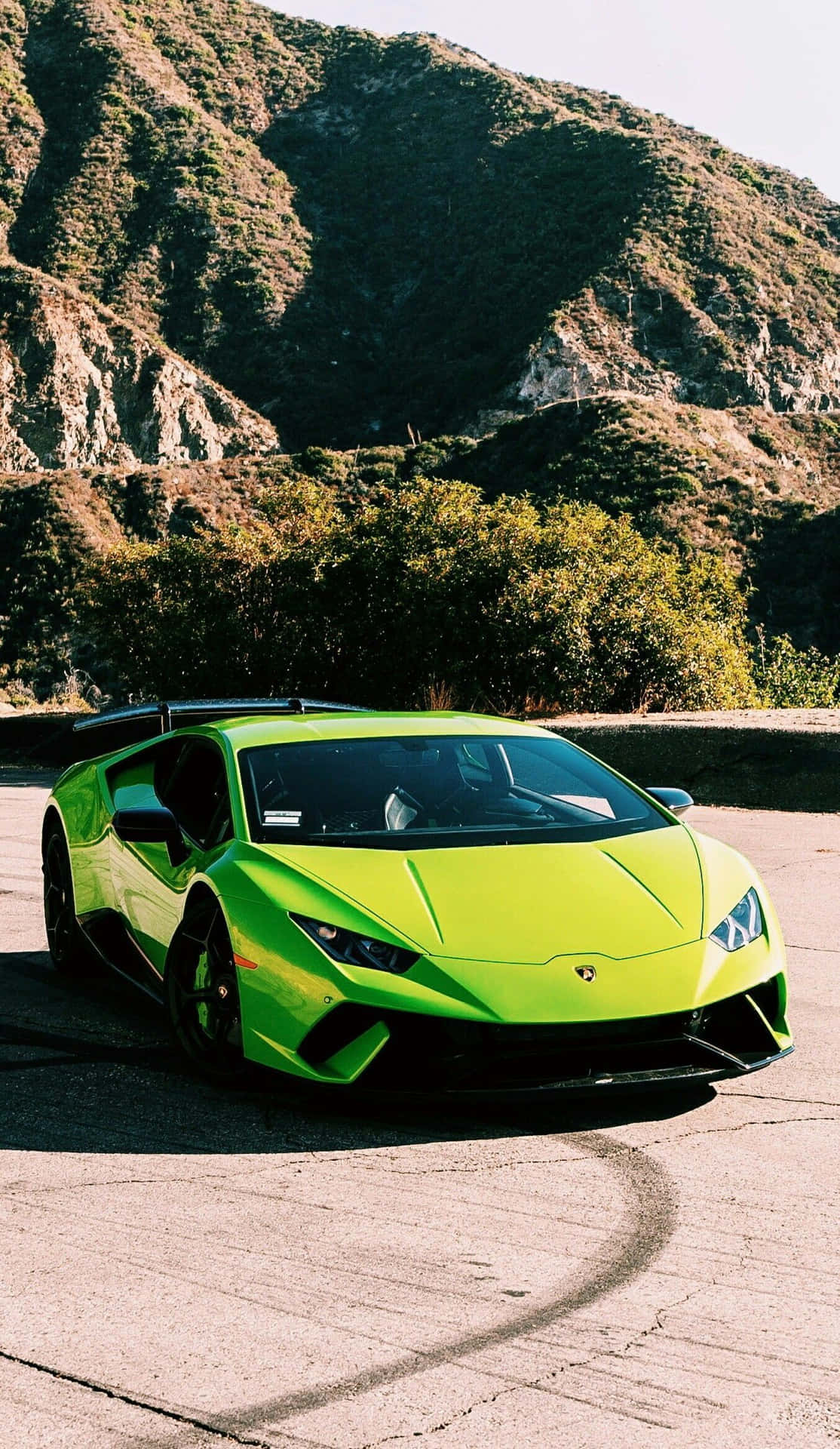 Accelerer dit stilspil med den blinkende grønne Lamborghini. Wallpaper