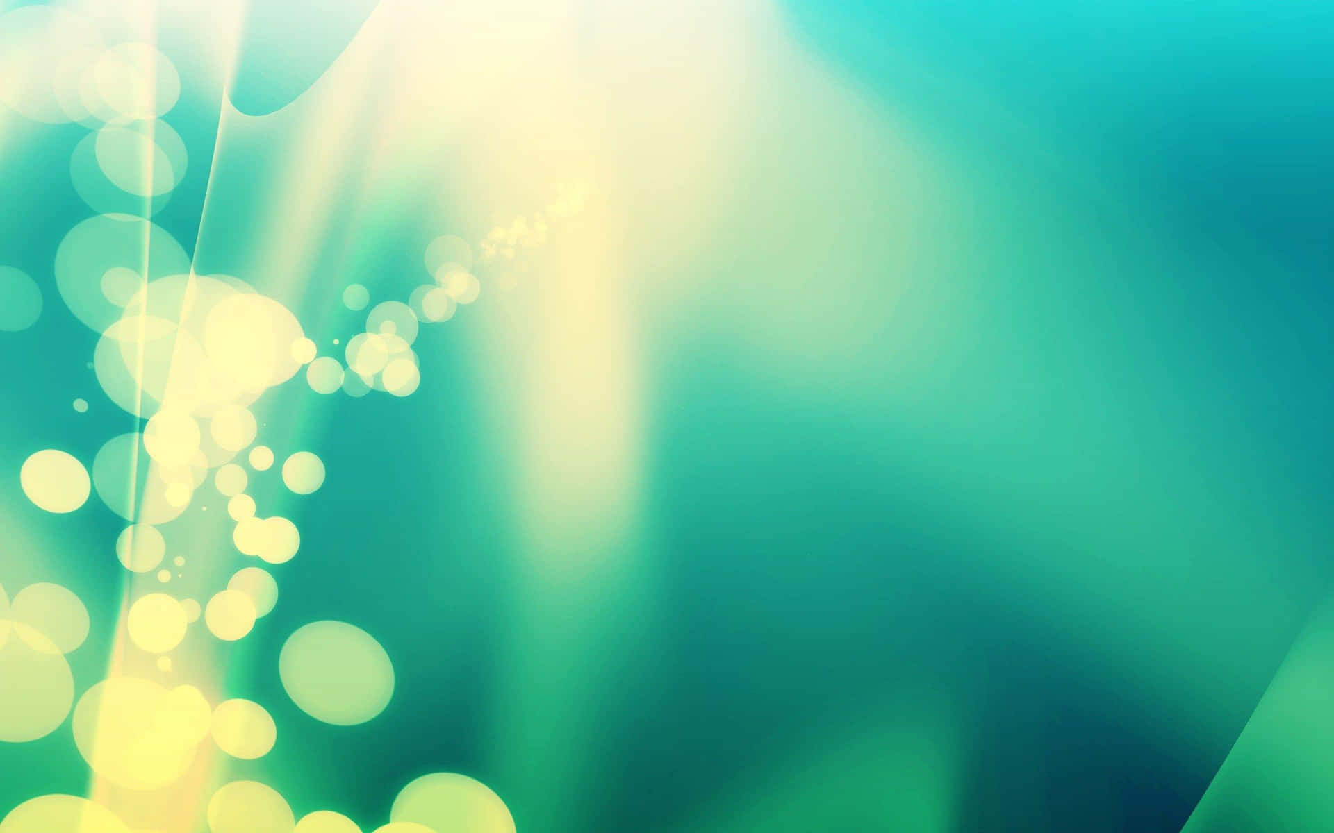 A Green And Yellow Abstract Background With Bokeh Lights Wallpaper