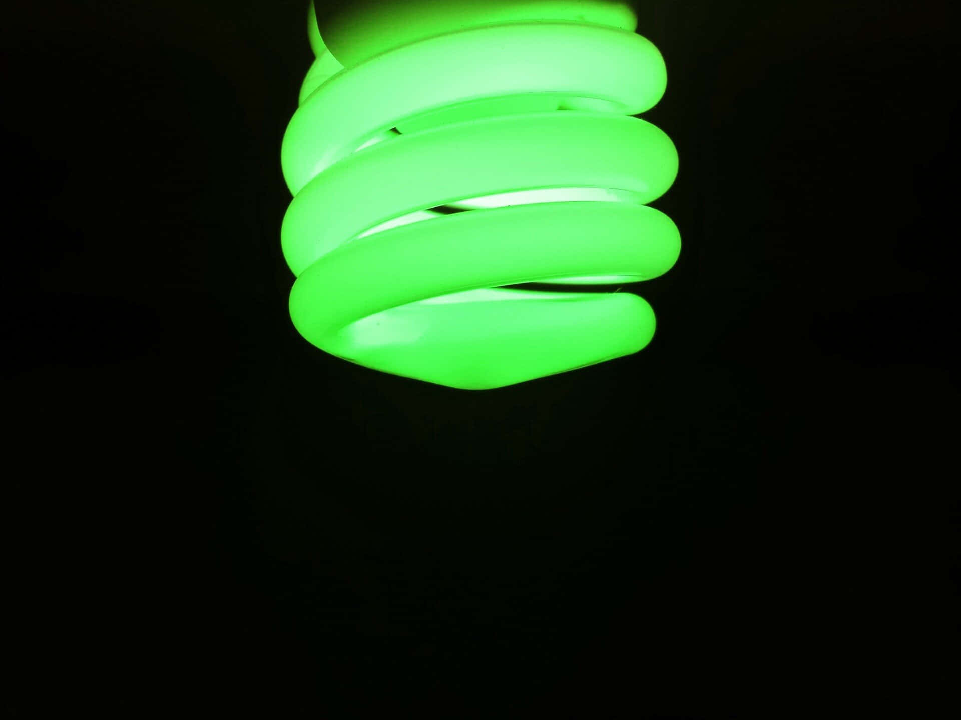 Green Led Light Bulb Black Background Wallpaper