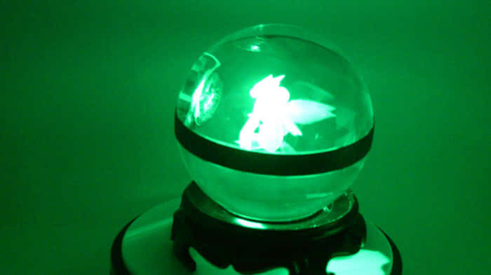 Green Light Scyther Inside Pokeball Lamp Wallpaper