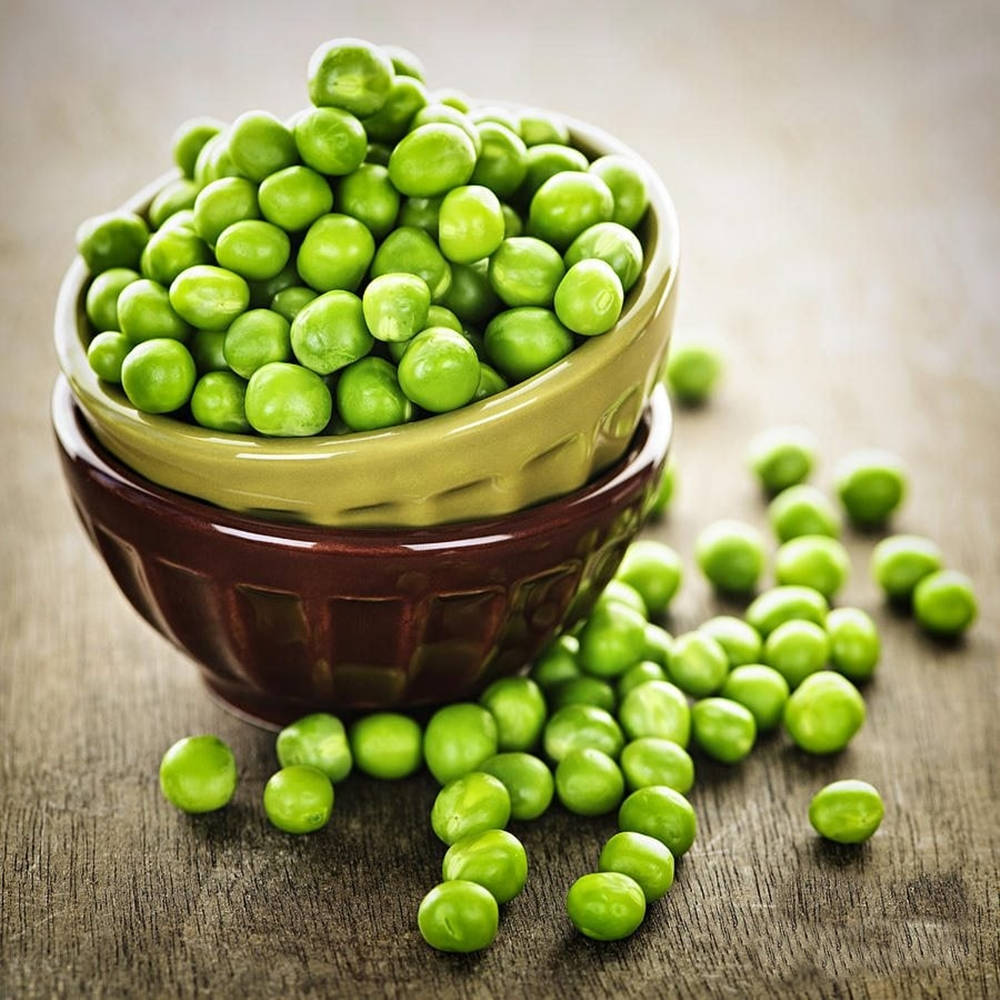 Green Peas In A Stacked Bowl Wallpaper