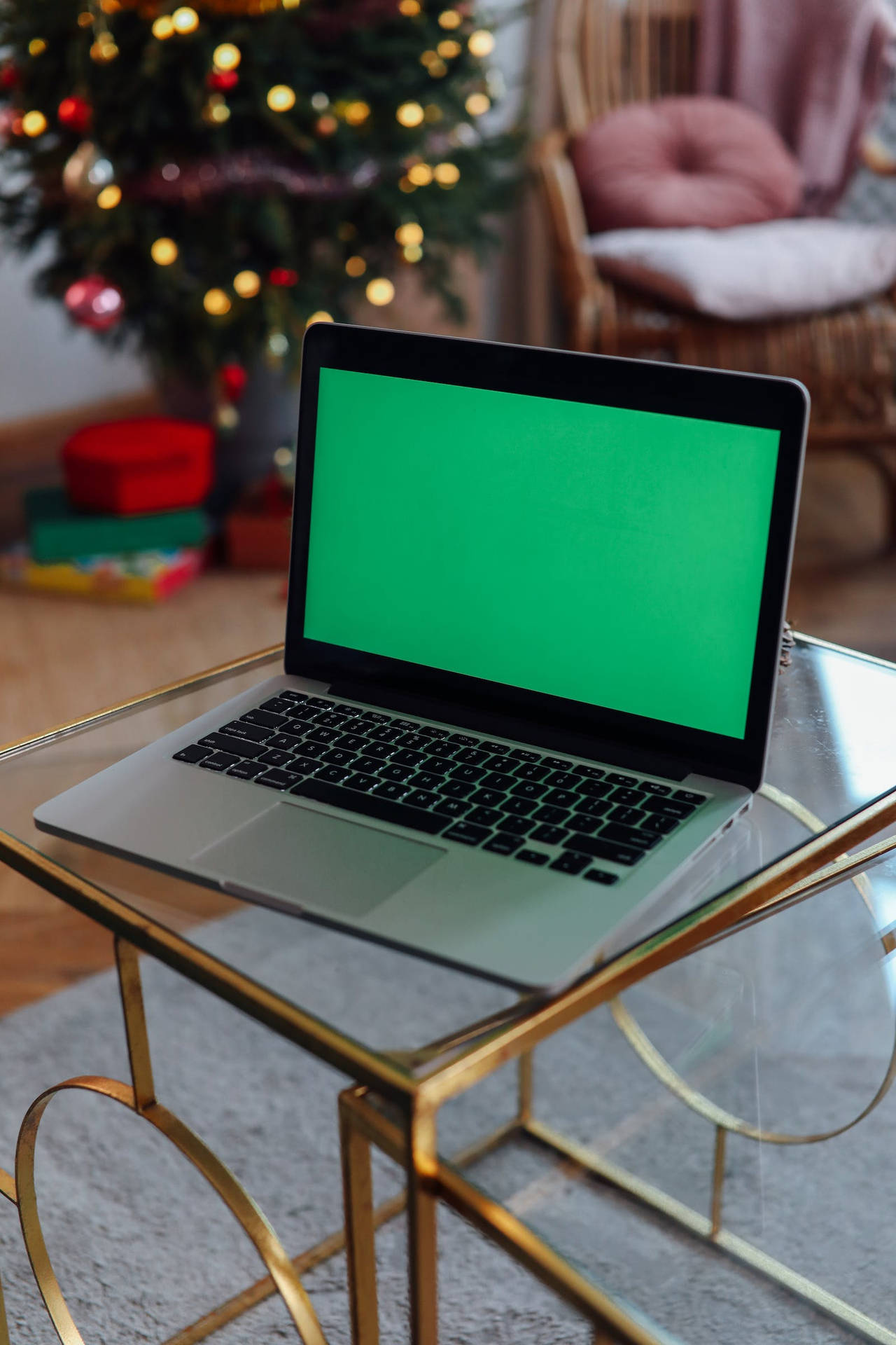 Green Screen Laptop On A Table