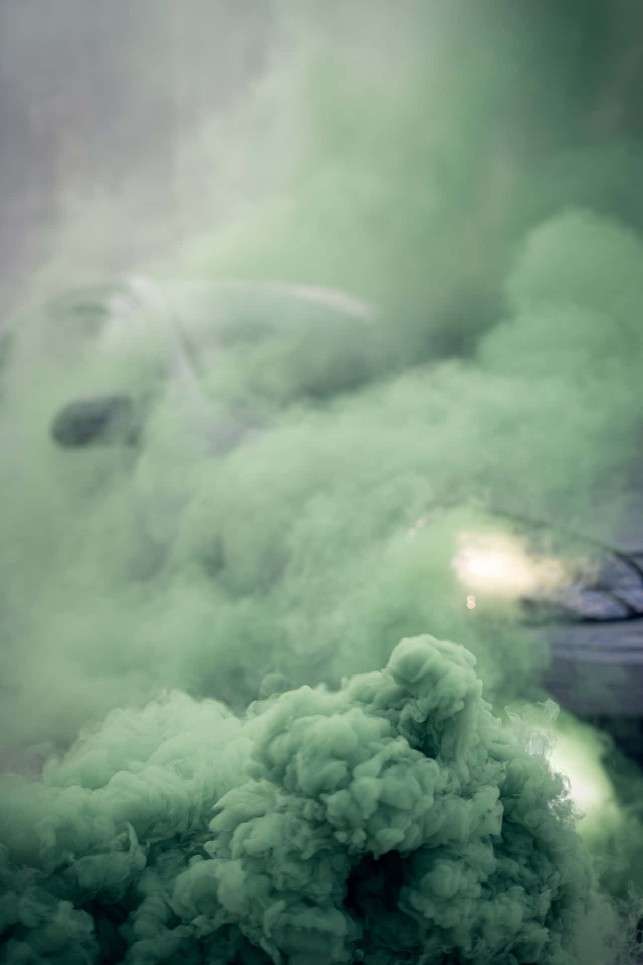 A Car Is Covered In Green Smoke