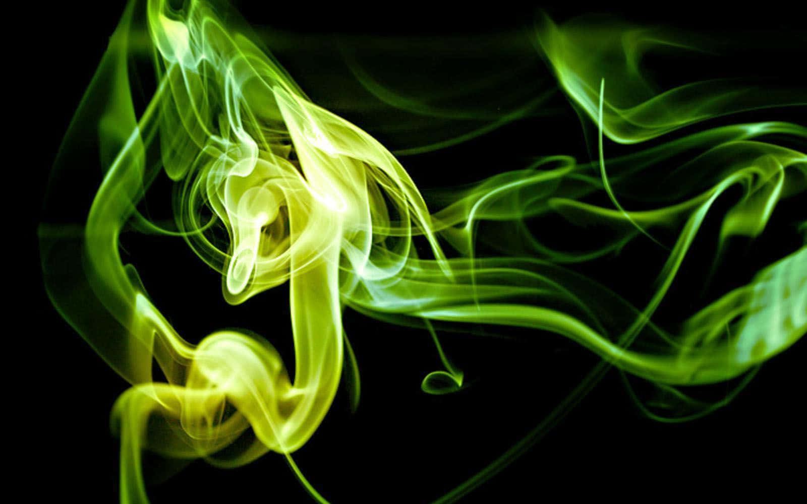 A Green Smoke Swirls On A Black Background