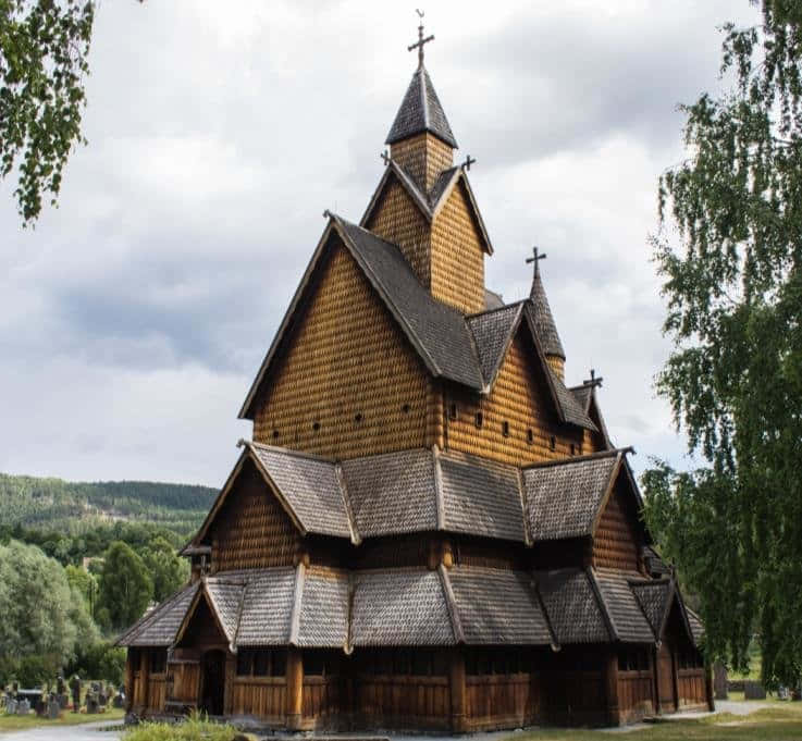 Green Trees At Heddal Stave Church Wallpaper