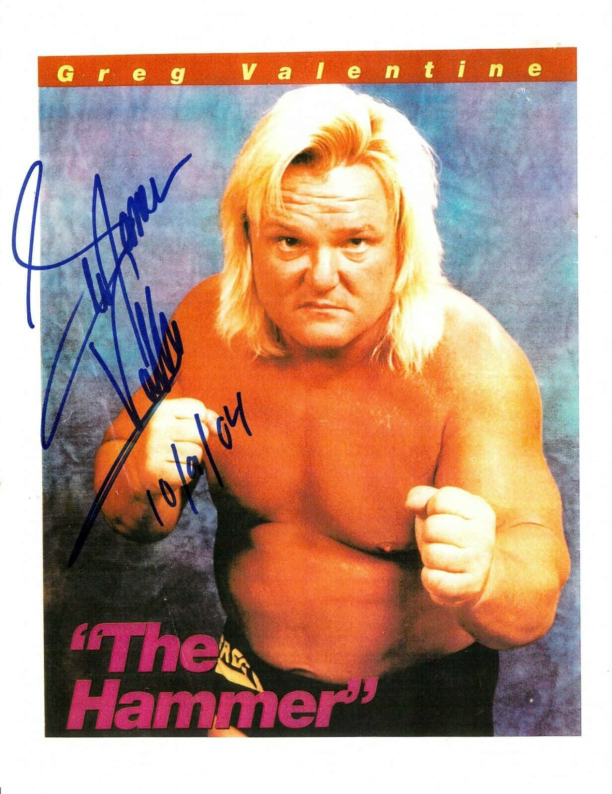 Caption: "Greg Valentine, a Legend of Wrestling, Poses for a Signed Promotional Photo" Wallpaper