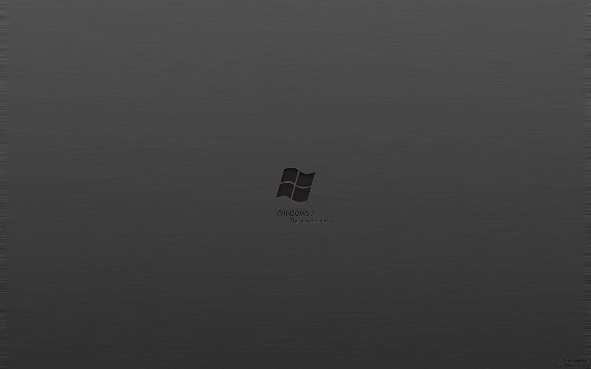 Fondode Pantalla Gris Con El Logo De Windows 7.