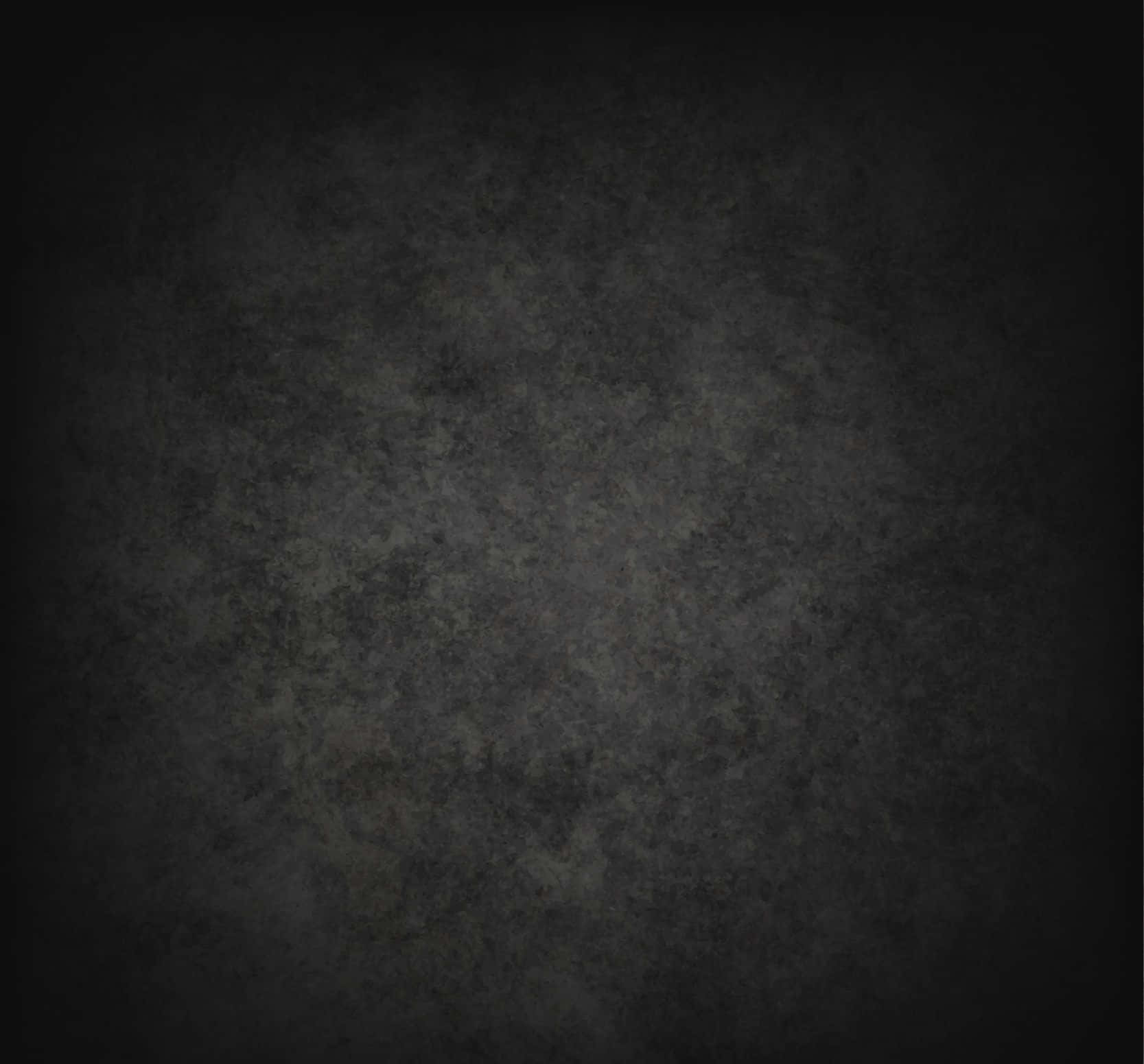 A Black Grunge Background With A Light Texture Wallpaper