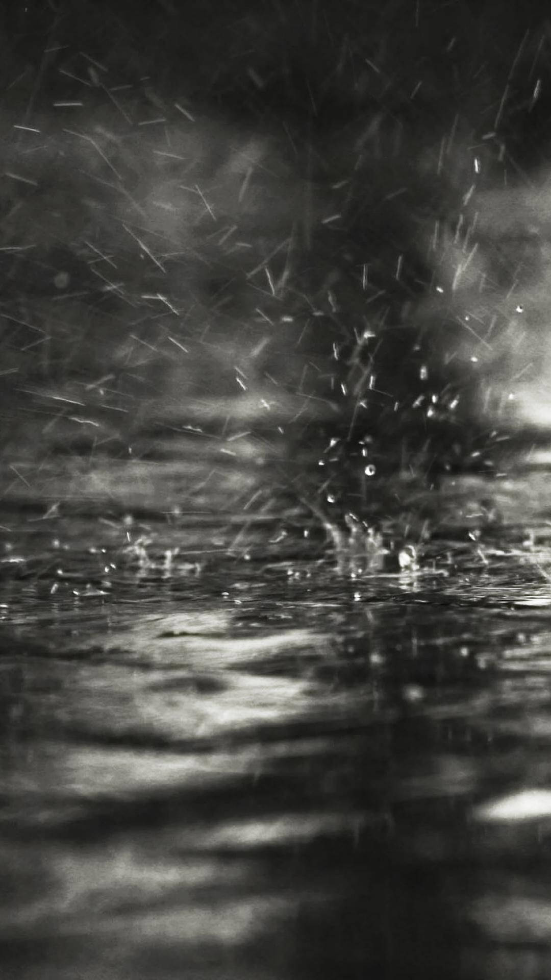 Grå iPhone regn på vandpytter Wallpaper