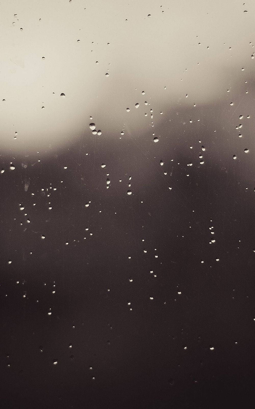 Grey iPhone Window With Rain Droplets Wallpaper